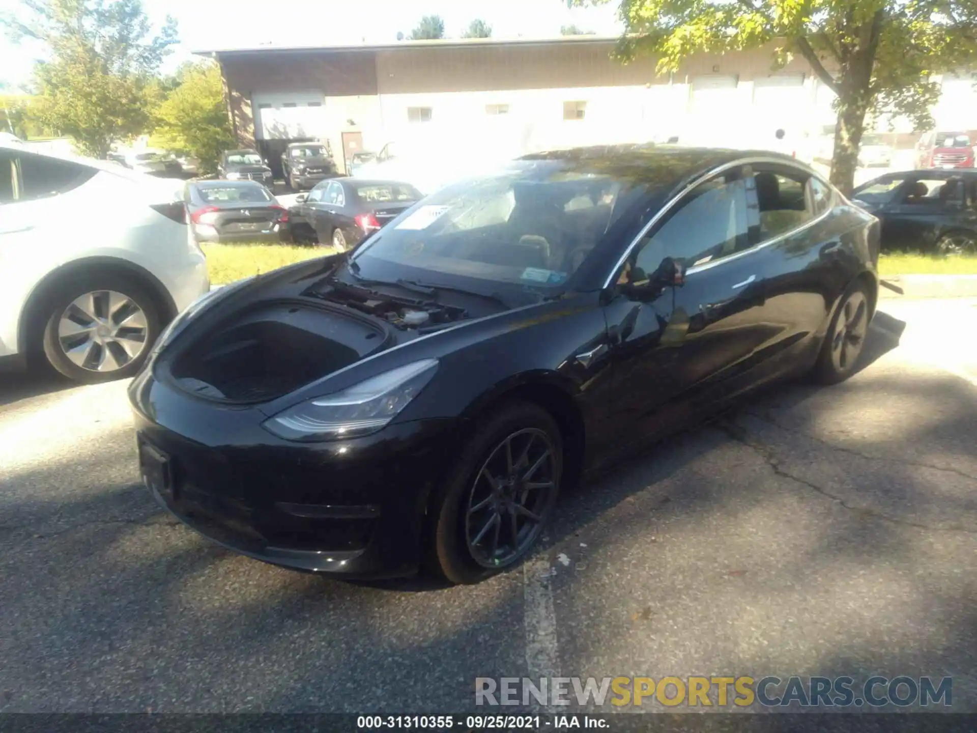 2 Photograph of a damaged car 5YJ3E1EB4LF800725 TESLA MODEL 3 2020