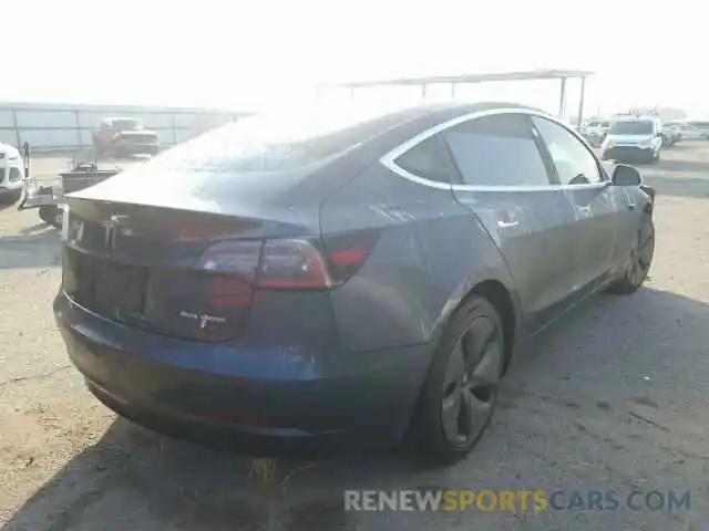 4 Photograph of a damaged car 5YJ3E1EB5LF533370 TESLA MODEL 3 2020