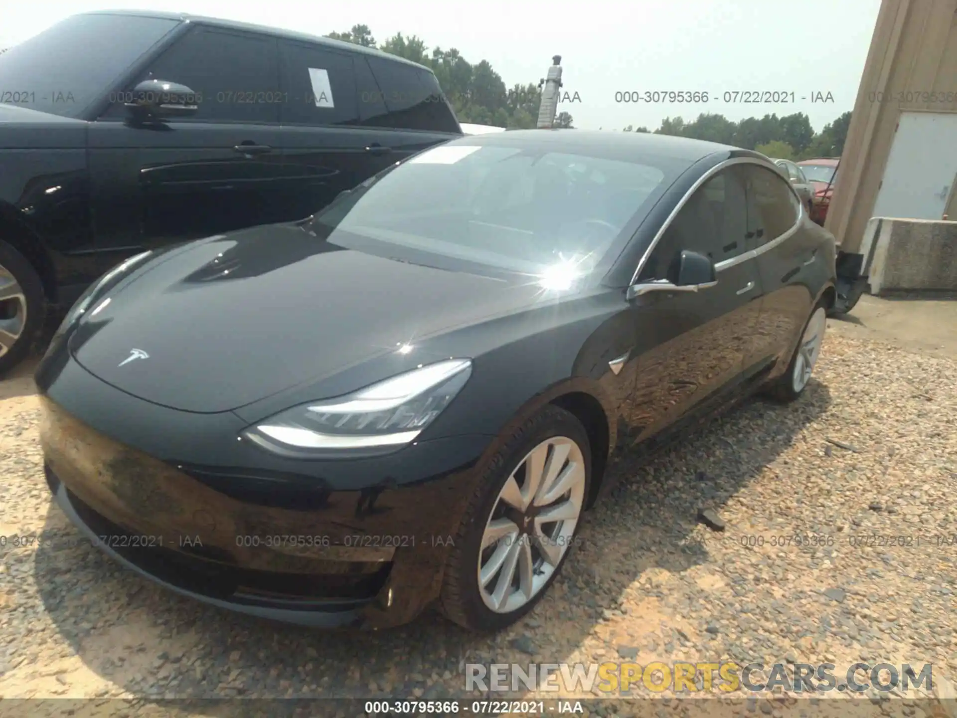 2 Photograph of a damaged car 5YJ3E1EB5LF600615 TESLA MODEL 3 2020