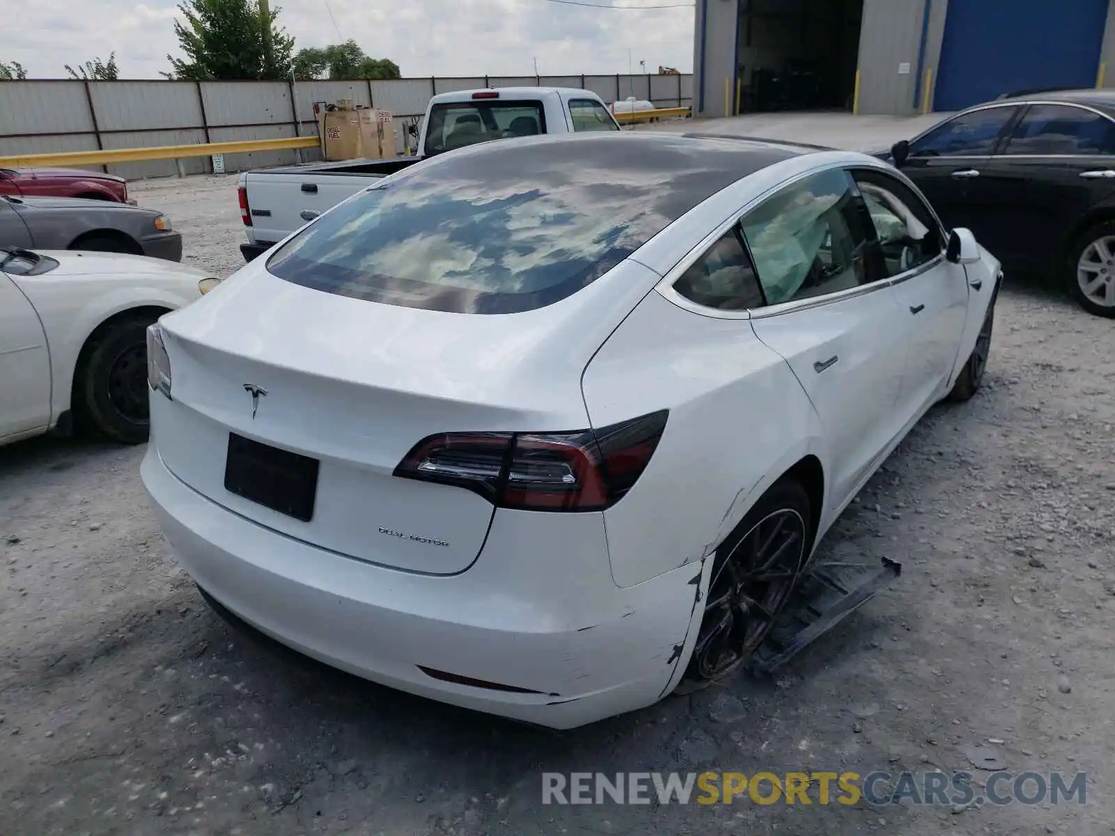 4 Photograph of a damaged car 5YJ3E1EB5LF617771 TESLA MODEL 3 2020