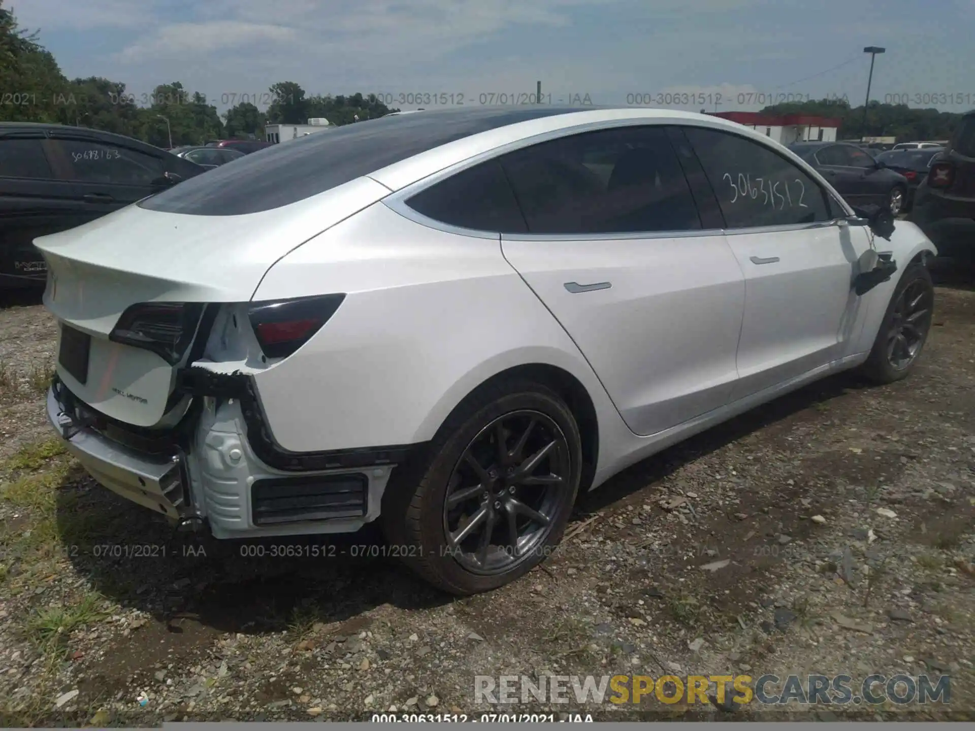 4 Photograph of a damaged car 5YJ3E1EB5LF618421 TESLA MODEL 3 2020