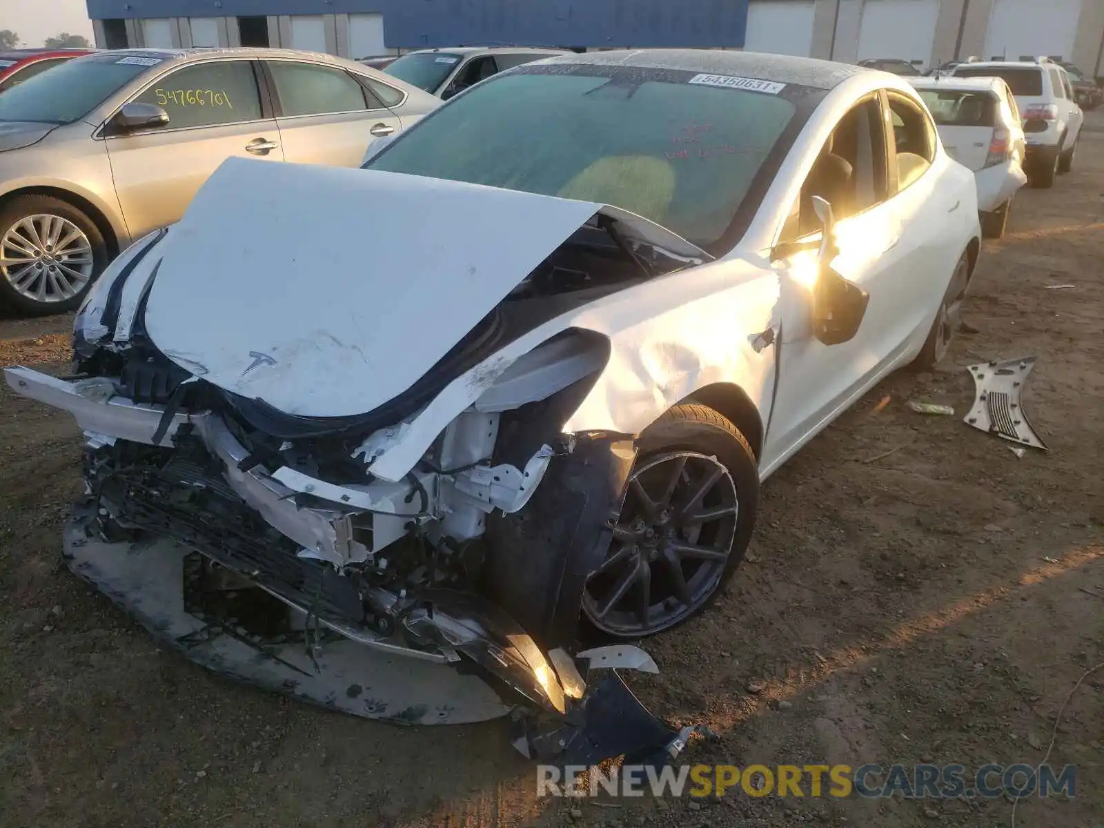 2 Photograph of a damaged car 5YJ3E1EB5LF637020 TESLA MODEL 3 2020