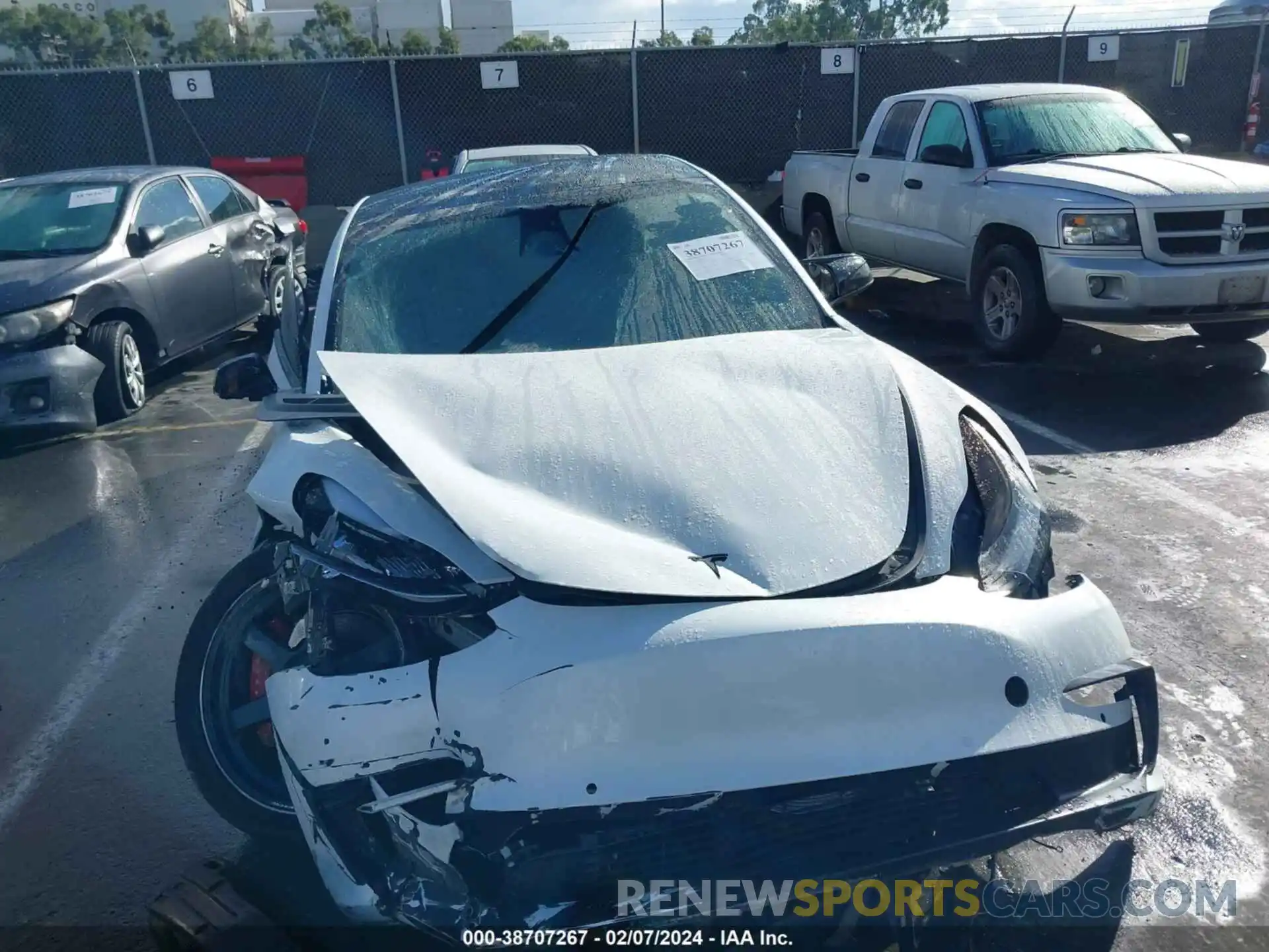 12 Photograph of a damaged car 5YJ3E1EB5LF665853 TESLA MODEL 3 2020