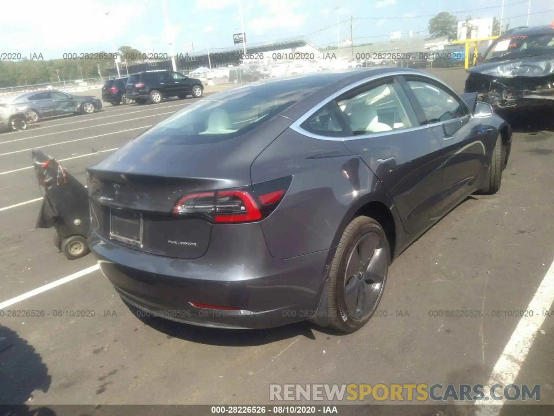 4 Photograph of a damaged car 5YJ3E1EB5LF667991 TESLA MODEL 3 2020