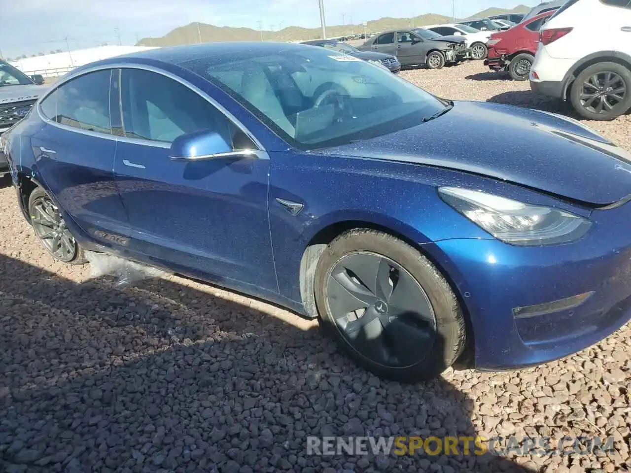 4 Photograph of a damaged car 5YJ3E1EB5LF668459 TESLA MODEL 3 2020