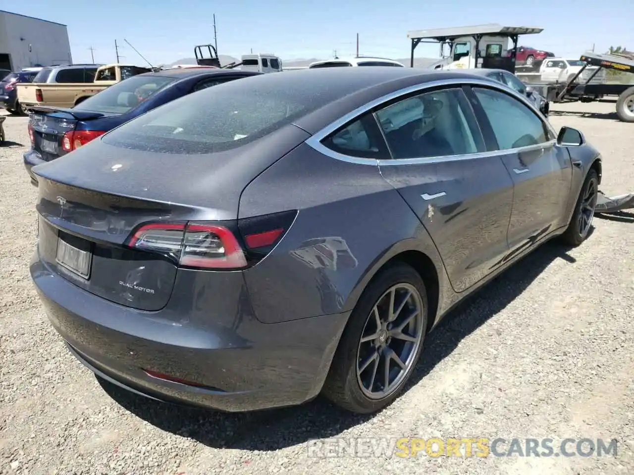 4 Photograph of a damaged car 5YJ3E1EB5LF711164 TESLA MODEL 3 2020