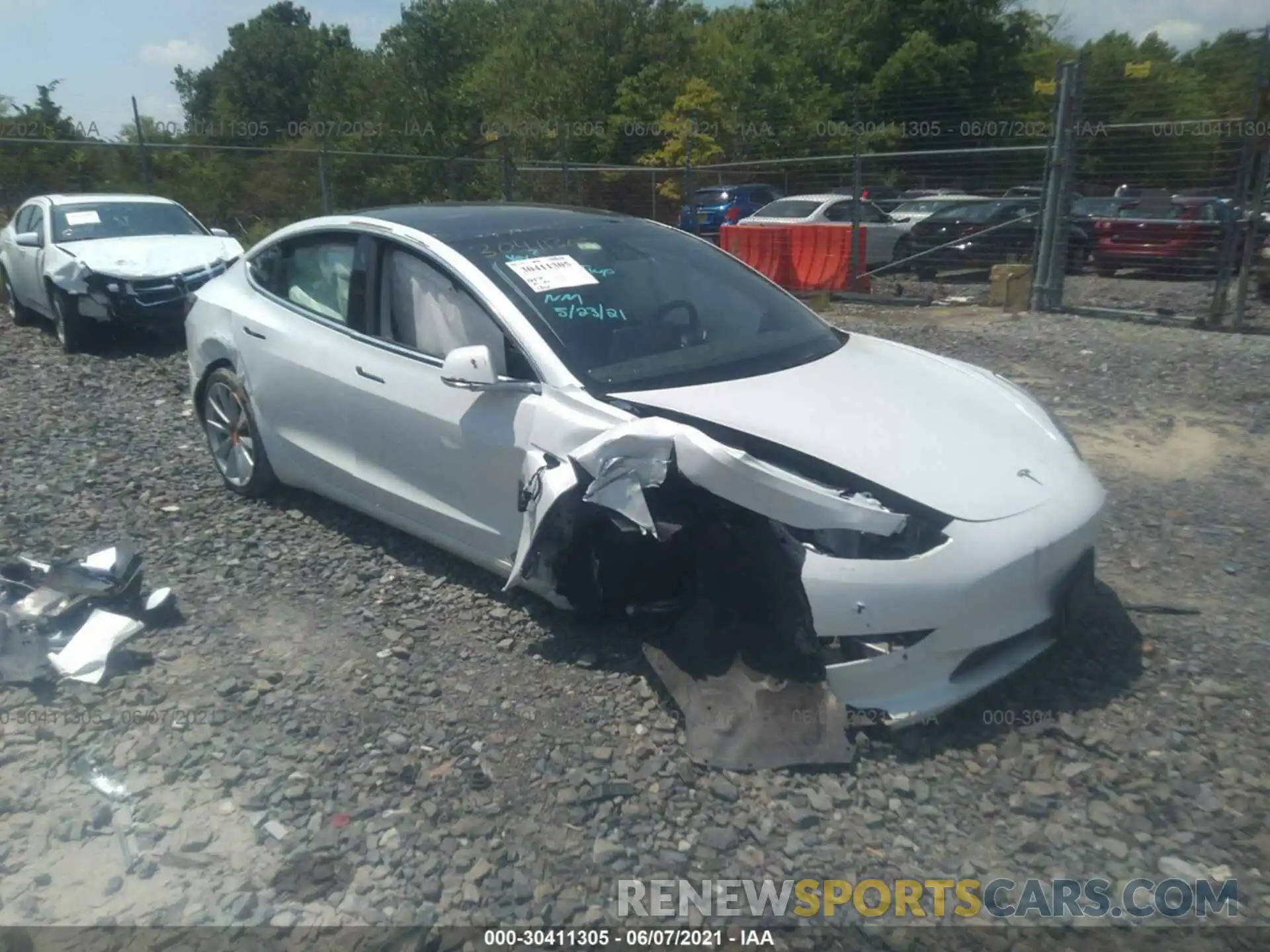 1 Photograph of a damaged car 5YJ3E1EB5LF712461 TESLA MODEL 3 2020