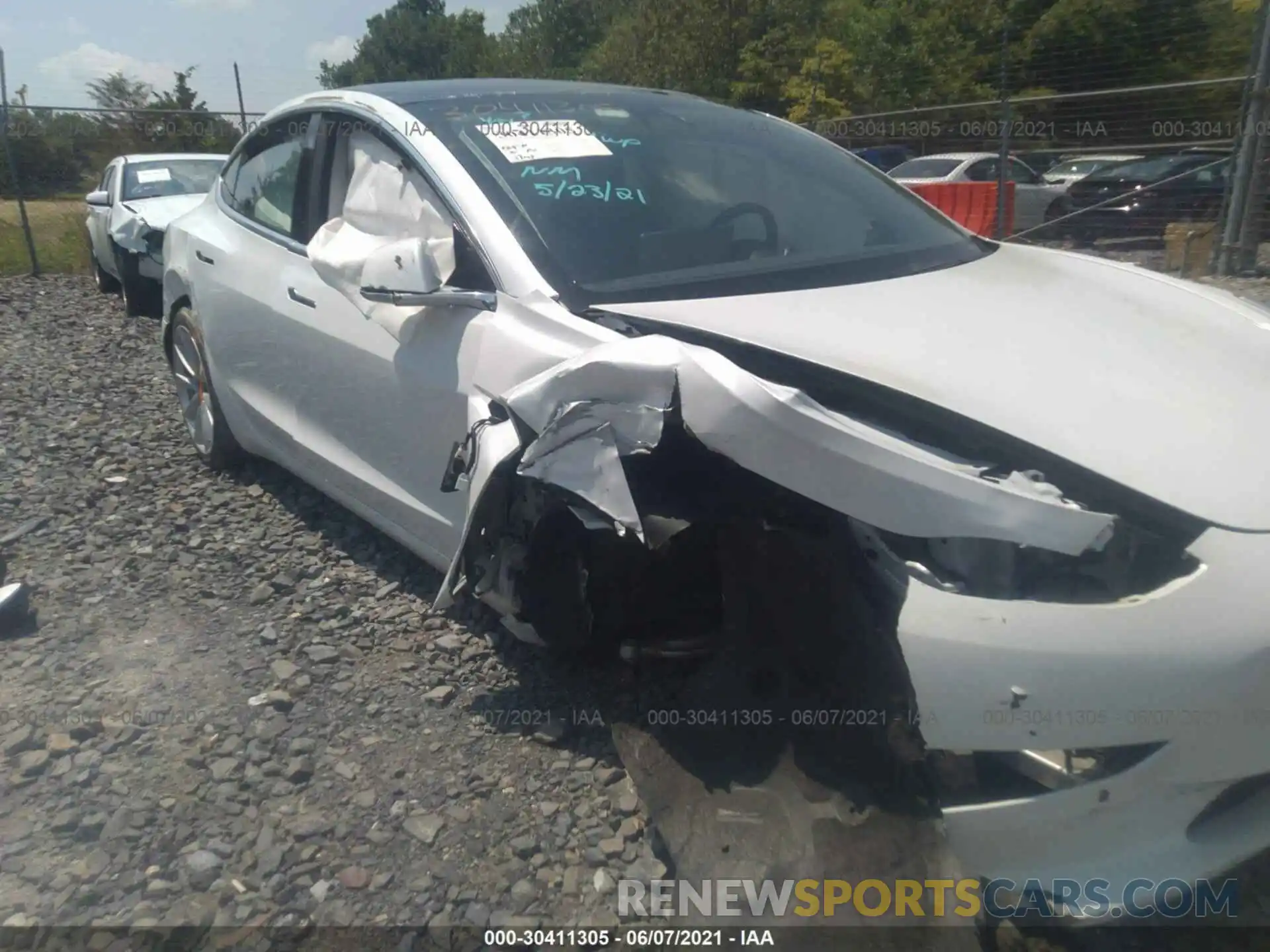 6 Photograph of a damaged car 5YJ3E1EB5LF712461 TESLA MODEL 3 2020