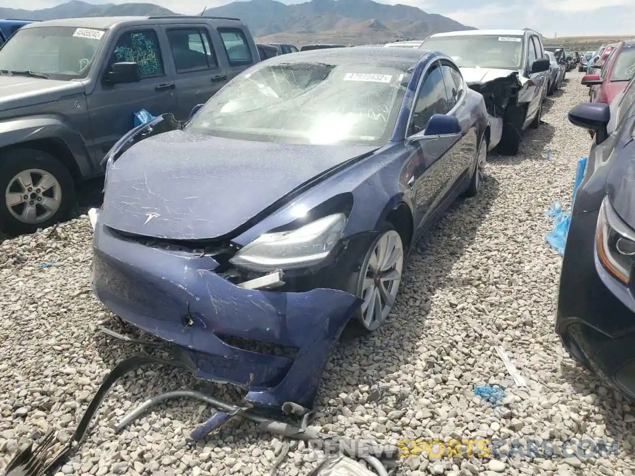 2 Photograph of a damaged car 5YJ3E1EB5LF741832 TESLA MODEL 3 2020