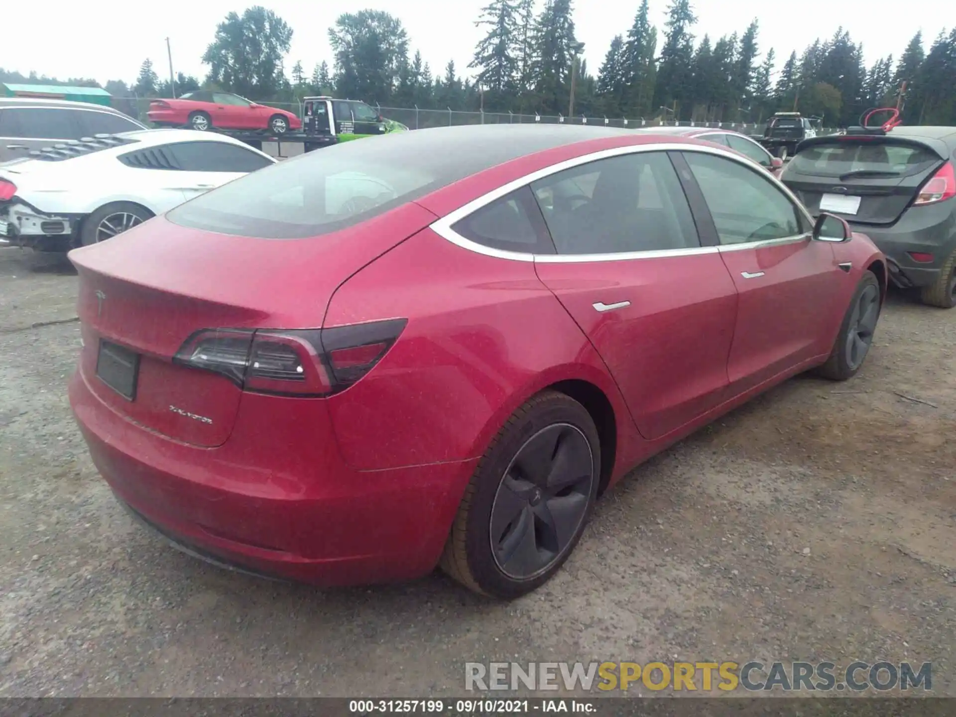 4 Photograph of a damaged car 5YJ3E1EB5LF746383 TESLA MODEL 3 2020