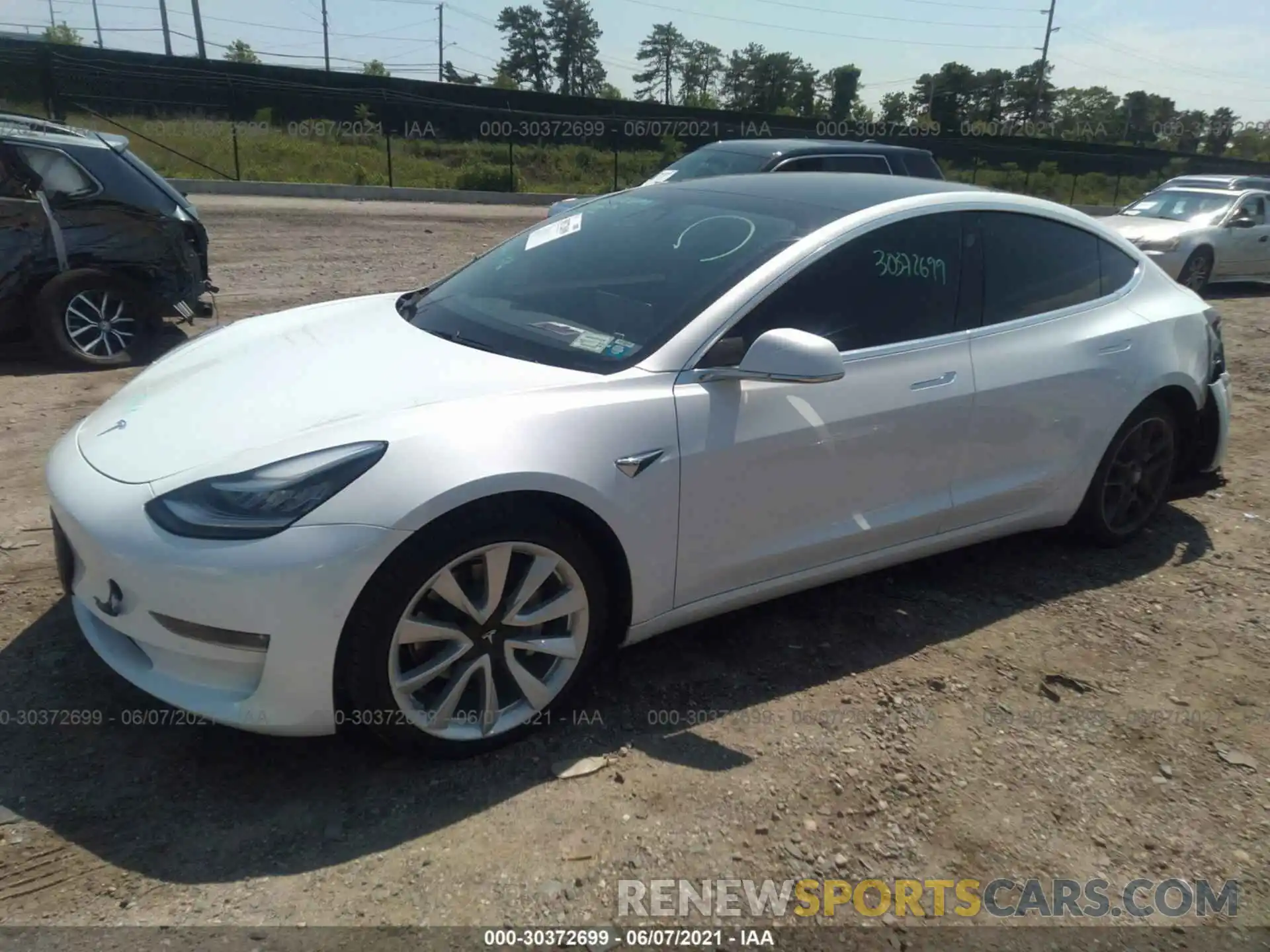 2 Photograph of a damaged car 5YJ3E1EB5LF791128 TESLA MODEL 3 2020