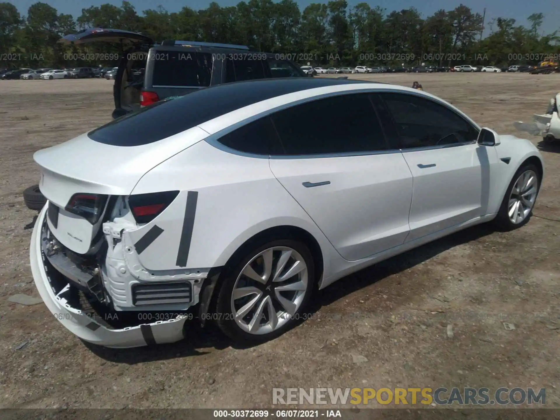 4 Photograph of a damaged car 5YJ3E1EB5LF791128 TESLA MODEL 3 2020