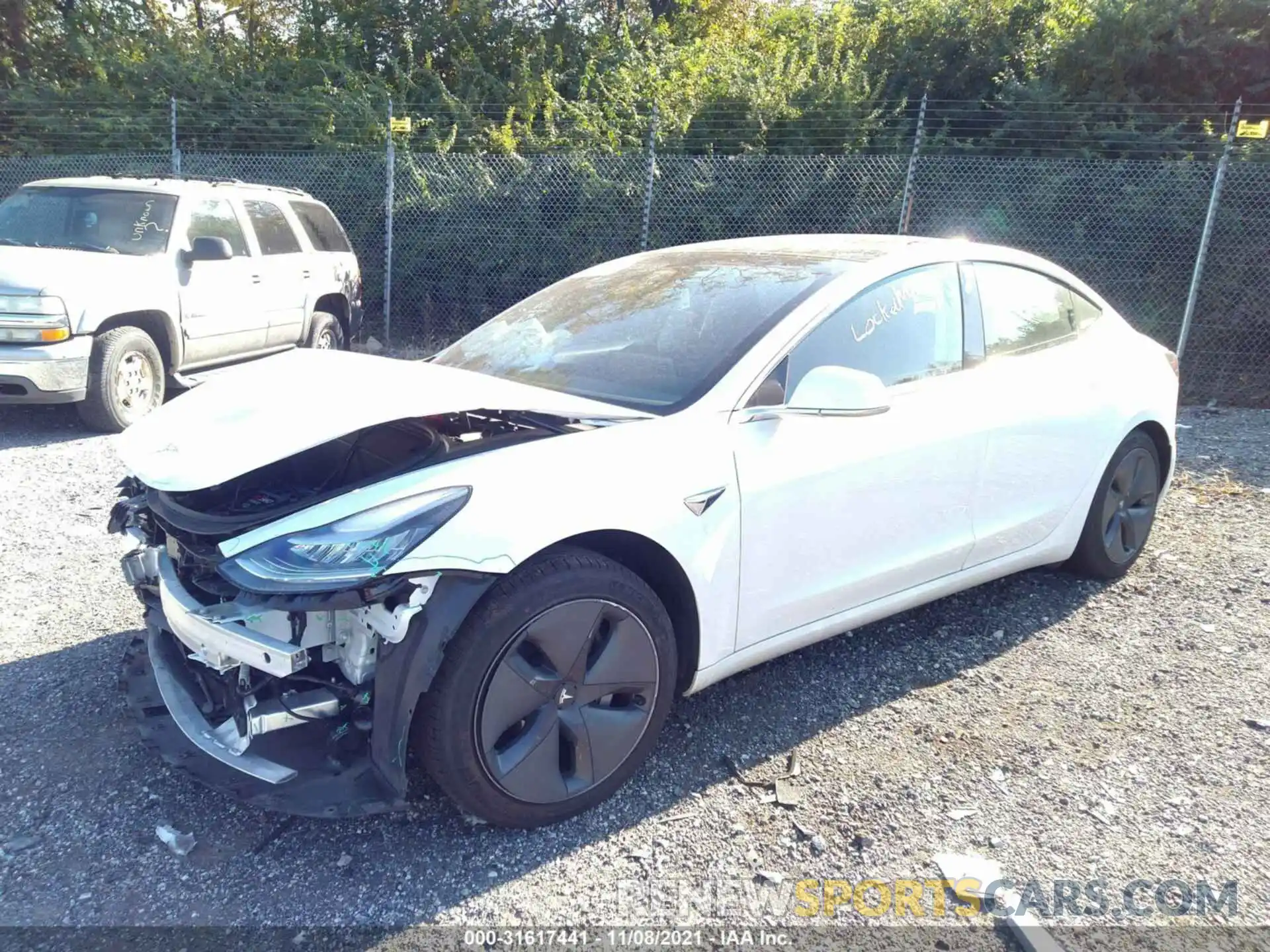 2 Photograph of a damaged car 5YJ3E1EB5LF795146 TESLA MODEL 3 2020