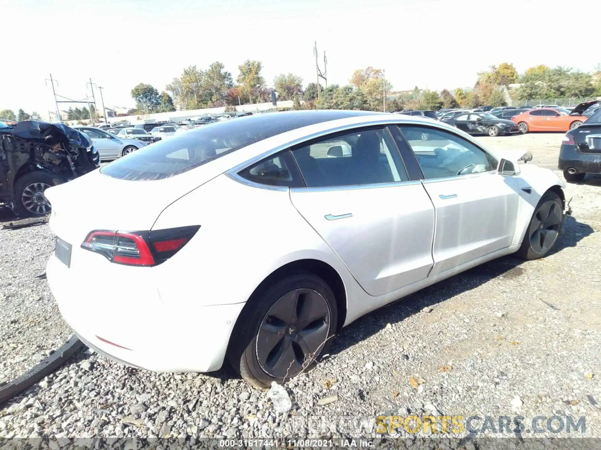 4 Photograph of a damaged car 5YJ3E1EB5LF795146 TESLA MODEL 3 2020