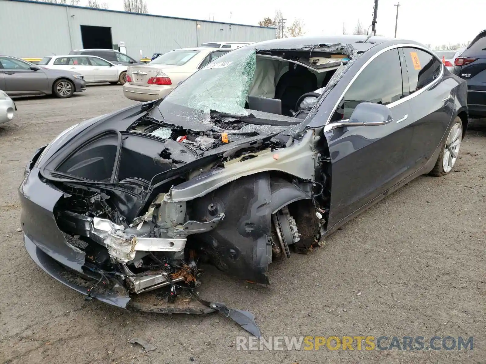 2 Photograph of a damaged car 5YJ3E1EB5LF801219 TESLA MODEL 3 2020