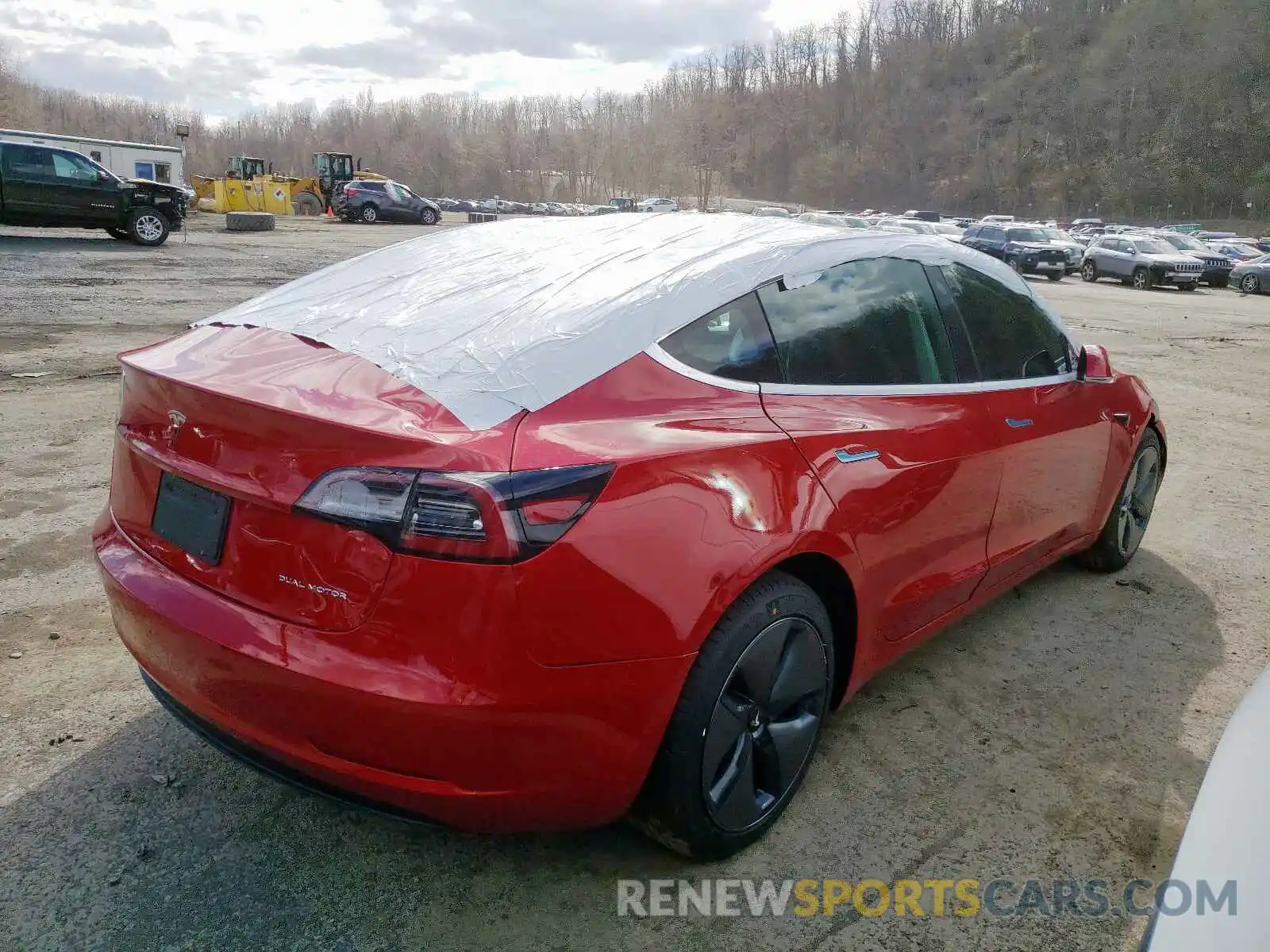 4 Photograph of a damaged car 5YJ3E1EB6LF617102 TESLA MODEL 3 2020