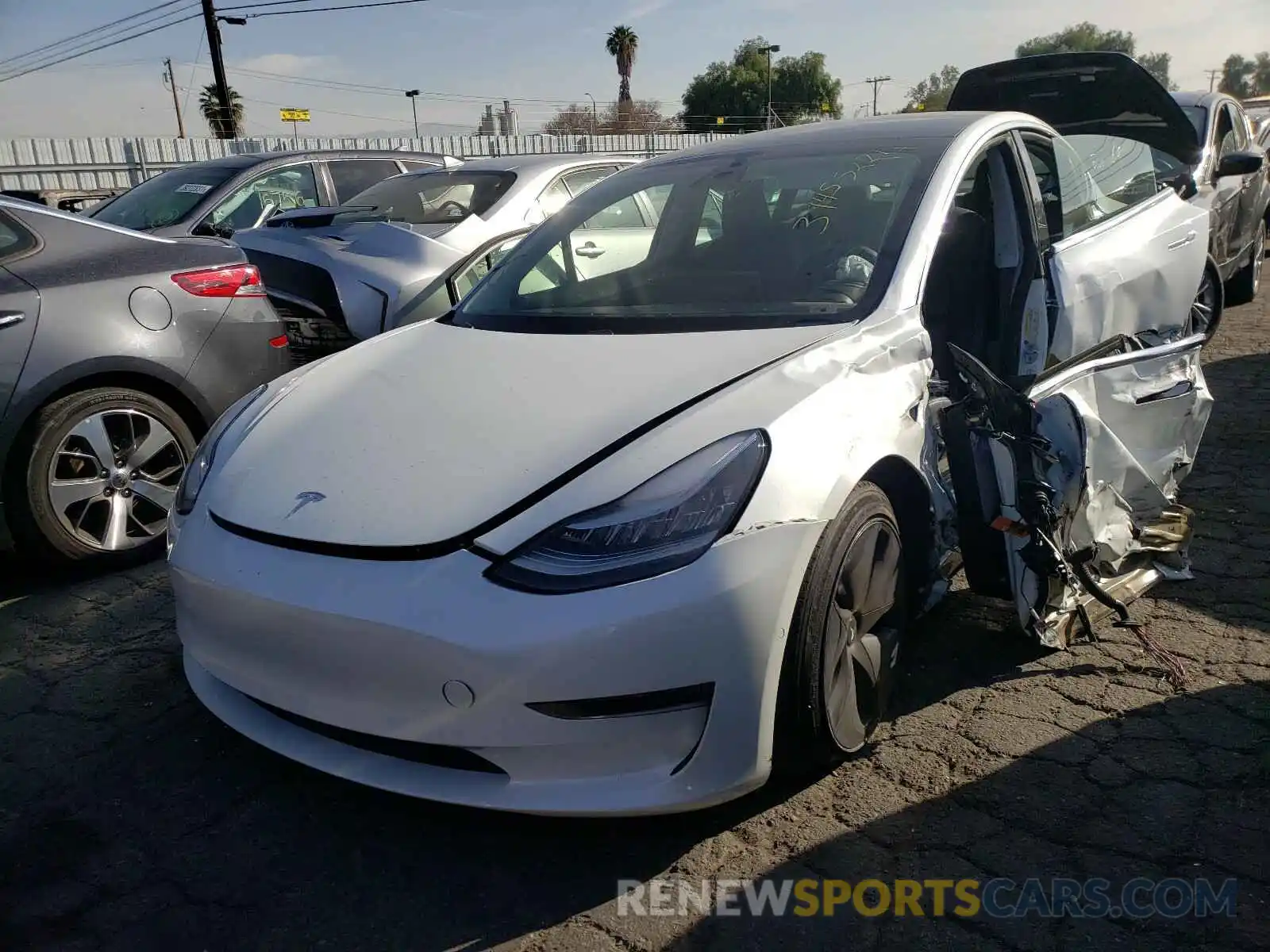 2 Photograph of a damaged car 5YJ3E1EB6LF618394 TESLA MODEL 3 2020