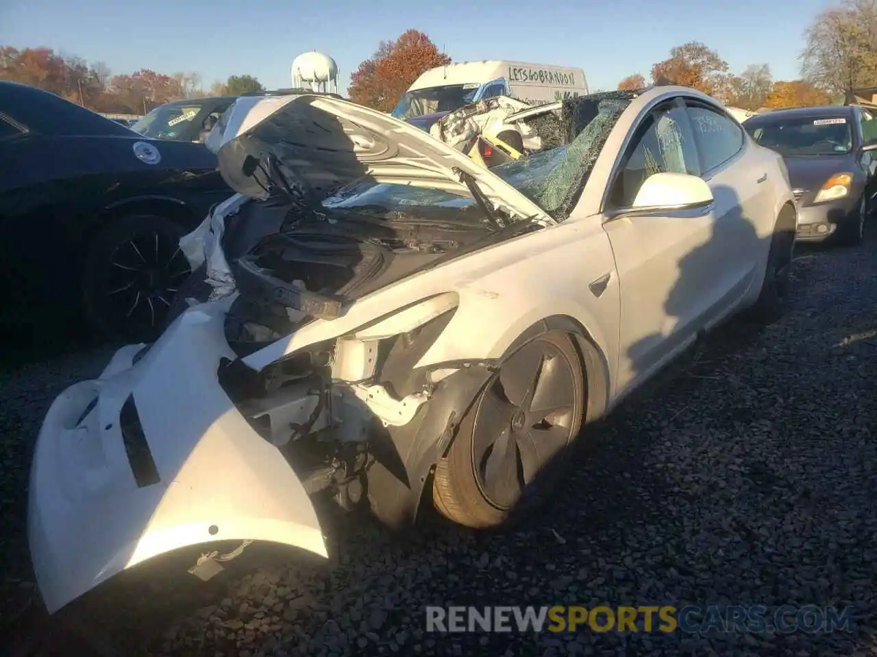 2 Photograph of a damaged car 5YJ3E1EB6LF618735 TESLA MODEL 3 2020