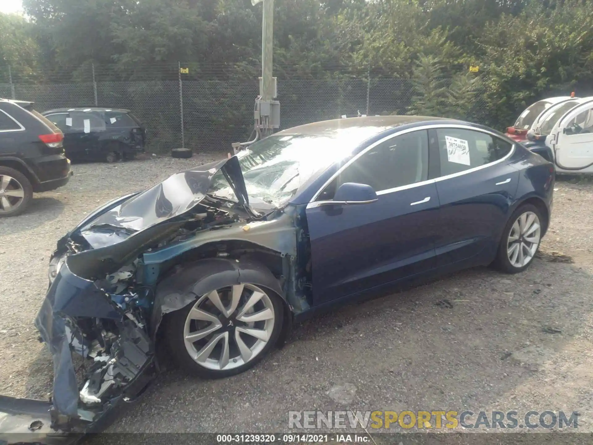 2 Photograph of a damaged car 5YJ3E1EB6LF620534 TESLA MODEL 3 2020