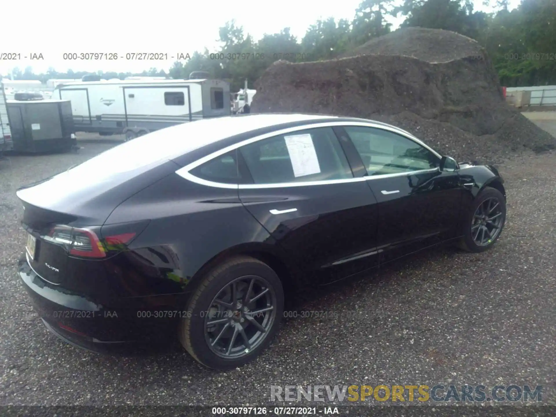 4 Photograph of a damaged car 5YJ3E1EB6LF635115 TESLA MODEL 3 2020