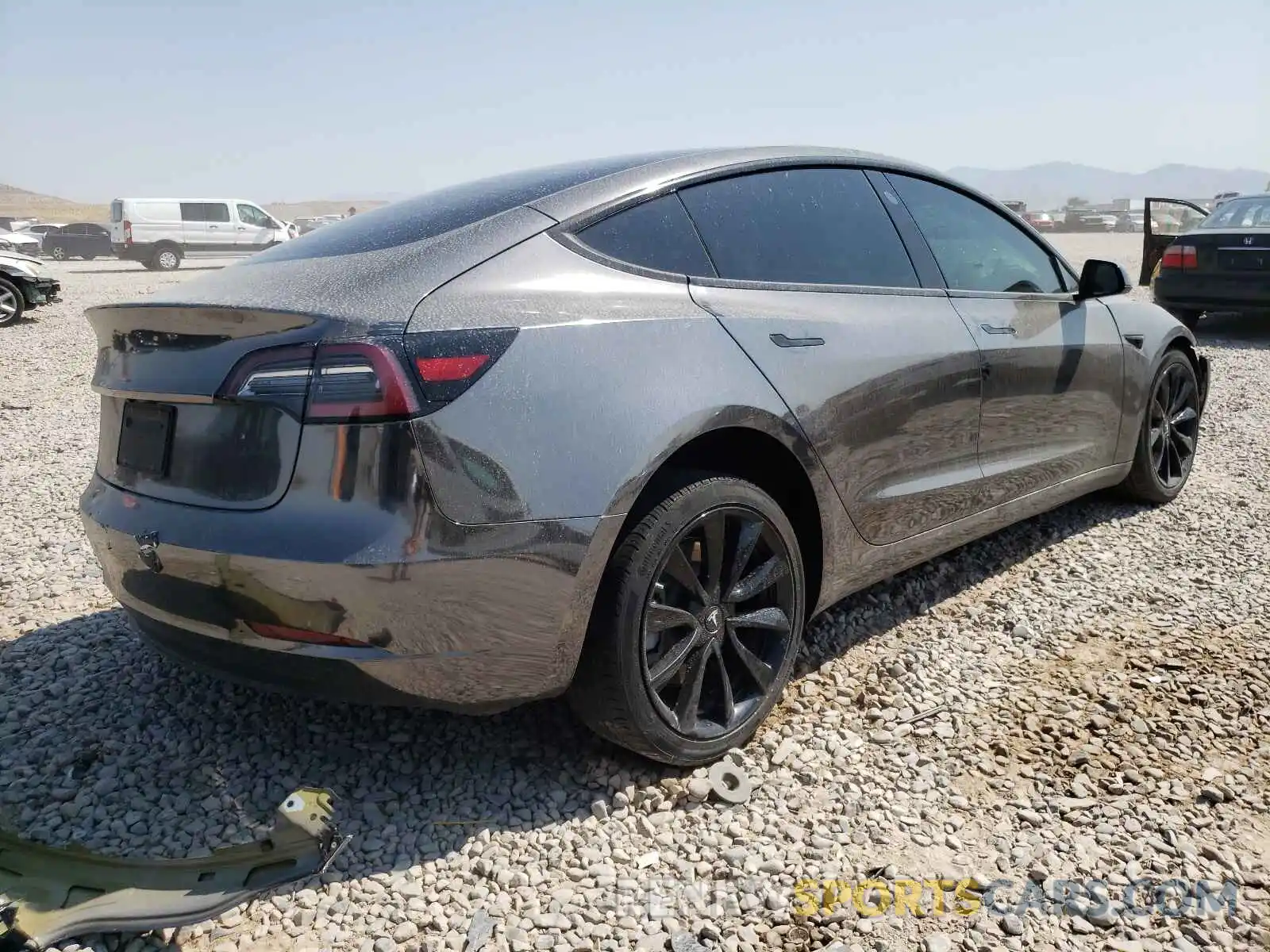 4 Photograph of a damaged car 5YJ3E1EB6LF639956 TESLA MODEL 3 2020