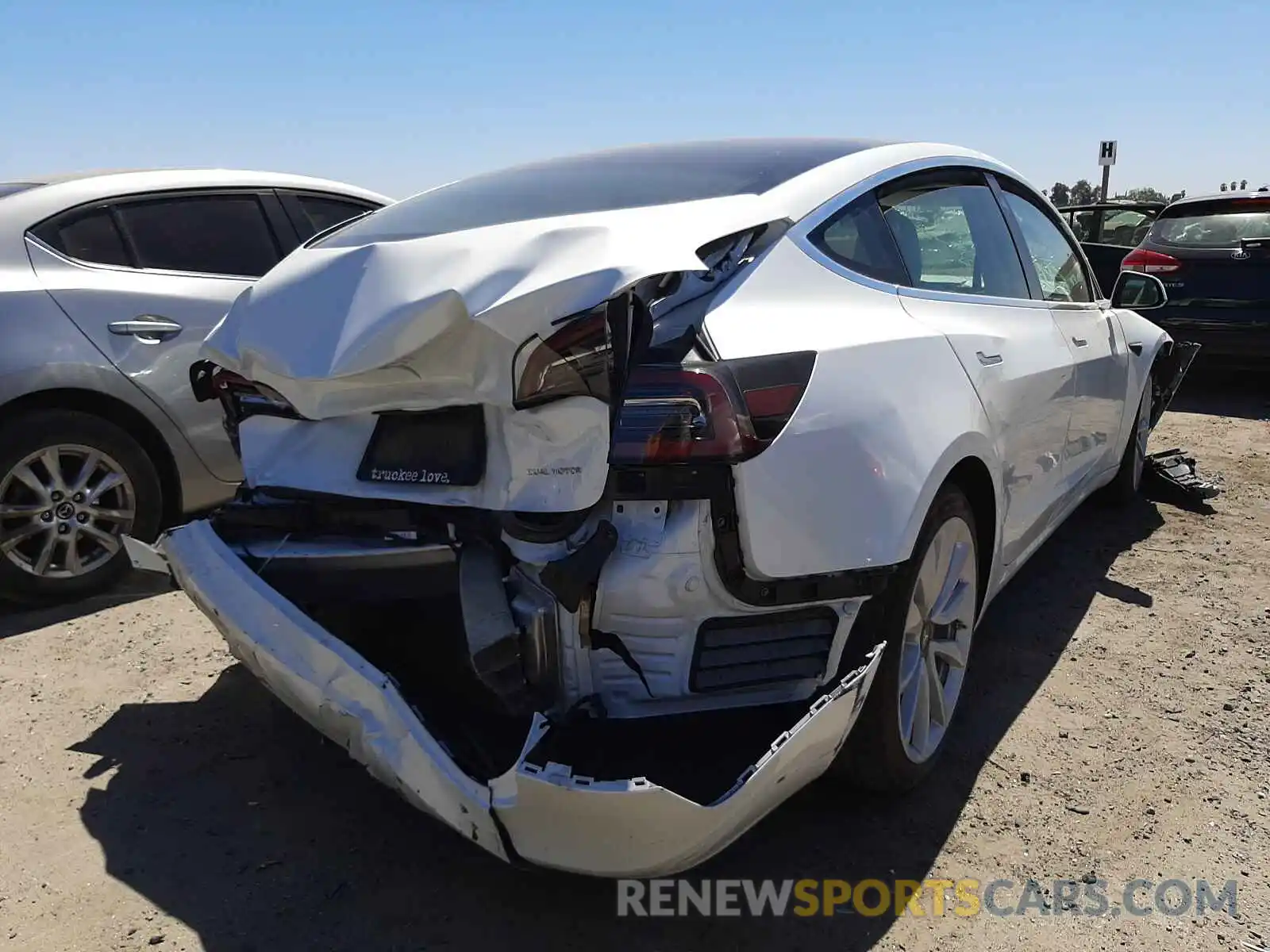 4 Photograph of a damaged car 5YJ3E1EB6LF640444 TESLA MODEL 3 2020