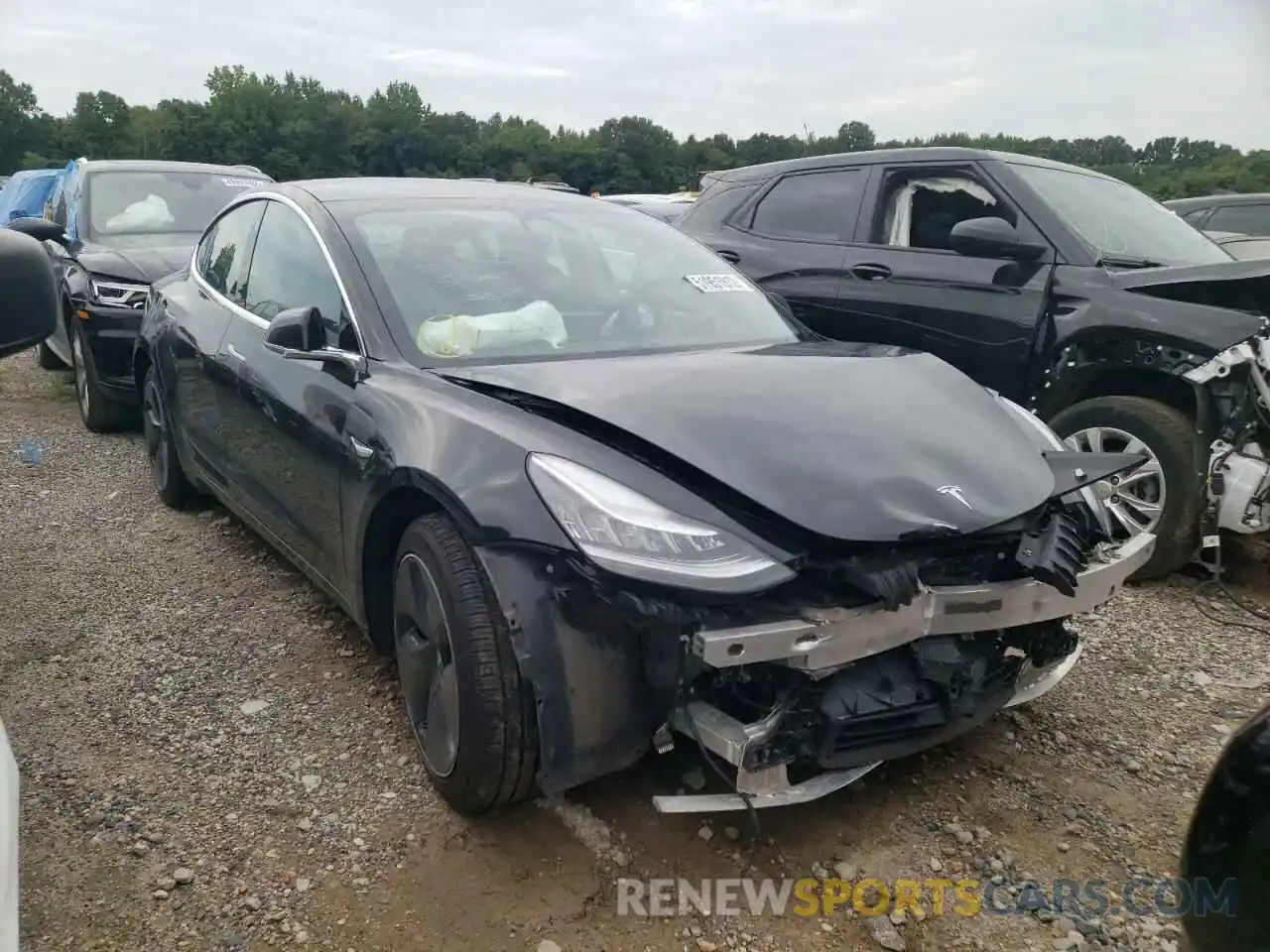 1 Photograph of a damaged car 5YJ3E1EB6LF662847 TESLA MODEL 3 2020