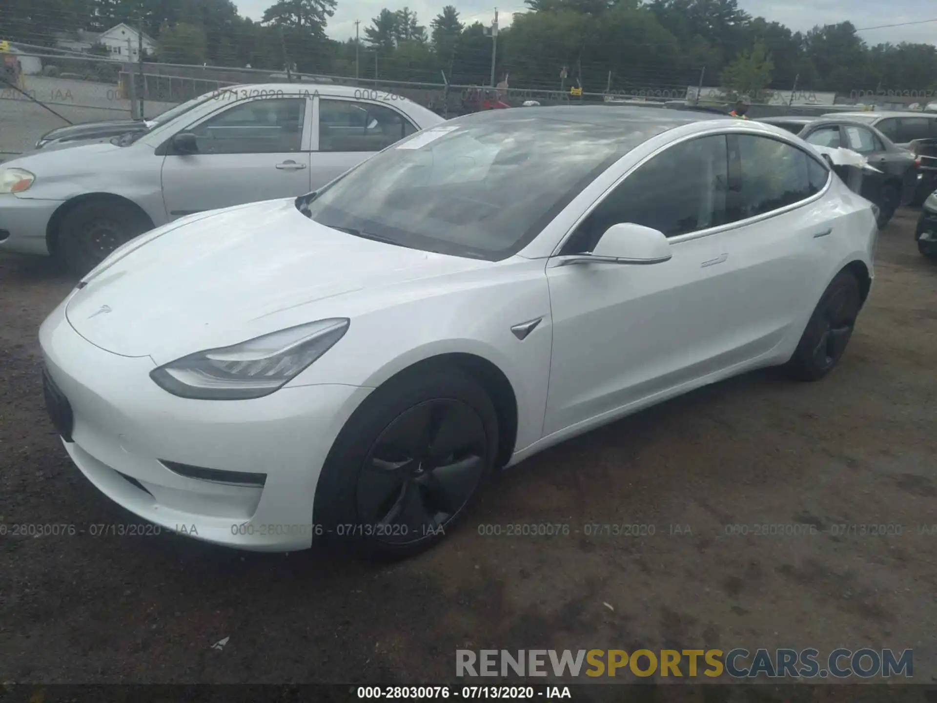 2 Photograph of a damaged car 5YJ3E1EB6LF665053 TESLA MODEL 3 2020