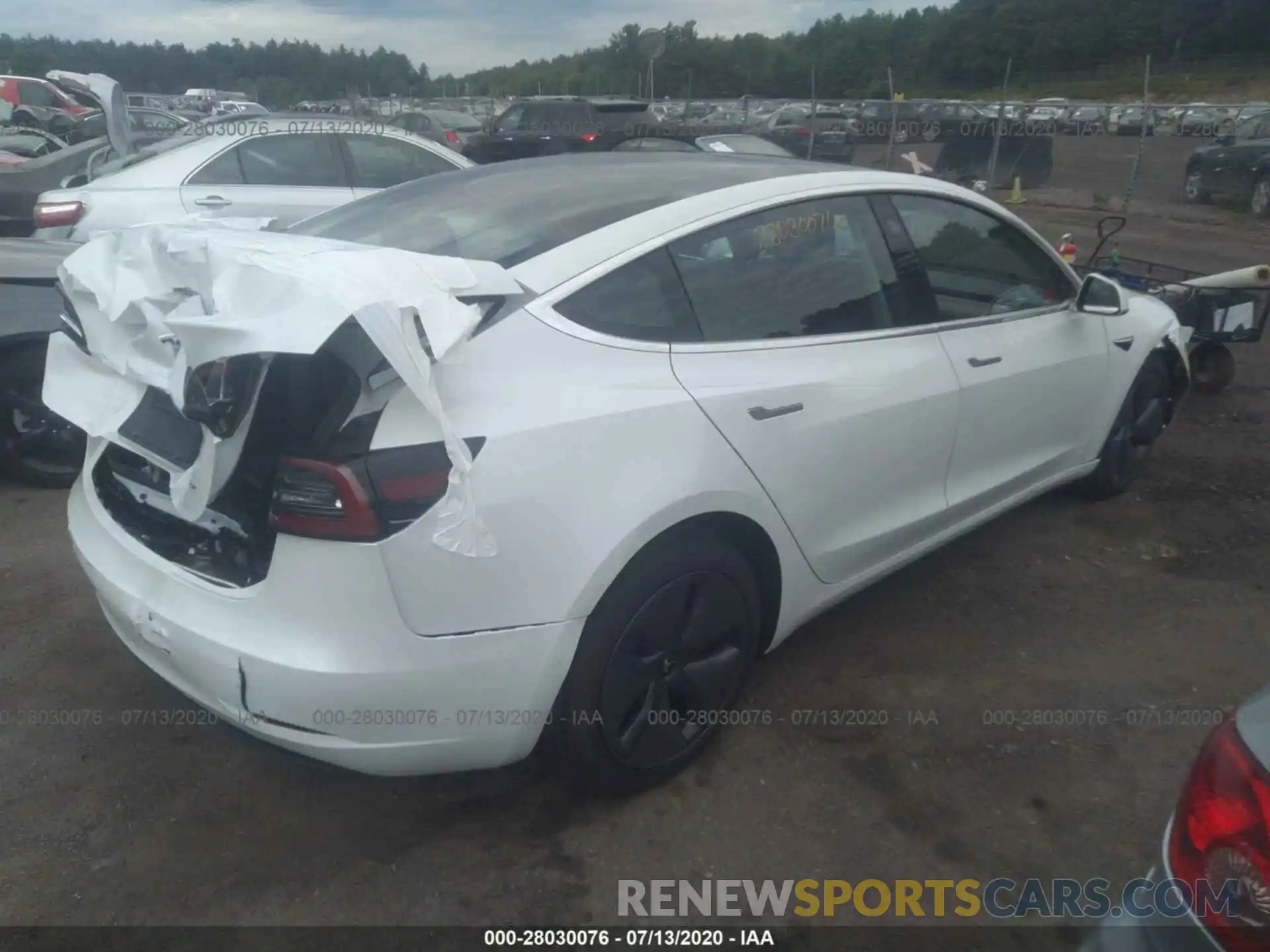 4 Photograph of a damaged car 5YJ3E1EB6LF665053 TESLA MODEL 3 2020