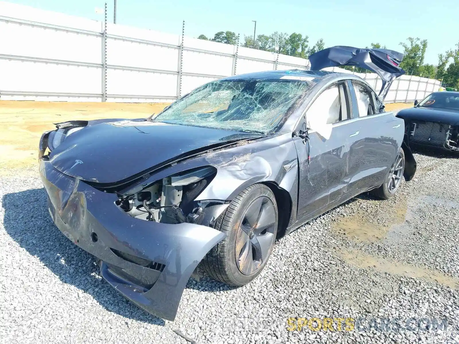 2 Photograph of a damaged car 5YJ3E1EB6LF717412 TESLA MODEL 3 2020