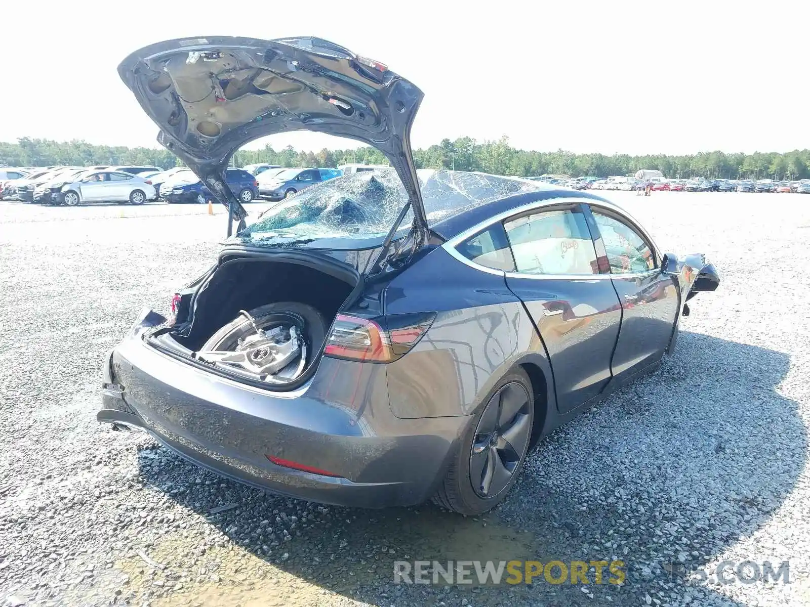 4 Photograph of a damaged car 5YJ3E1EB6LF717412 TESLA MODEL 3 2020