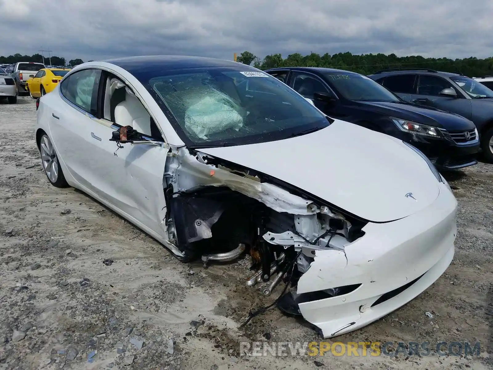 1 Photograph of a damaged car 5YJ3E1EB6LF719774 TESLA MODEL 3 2020