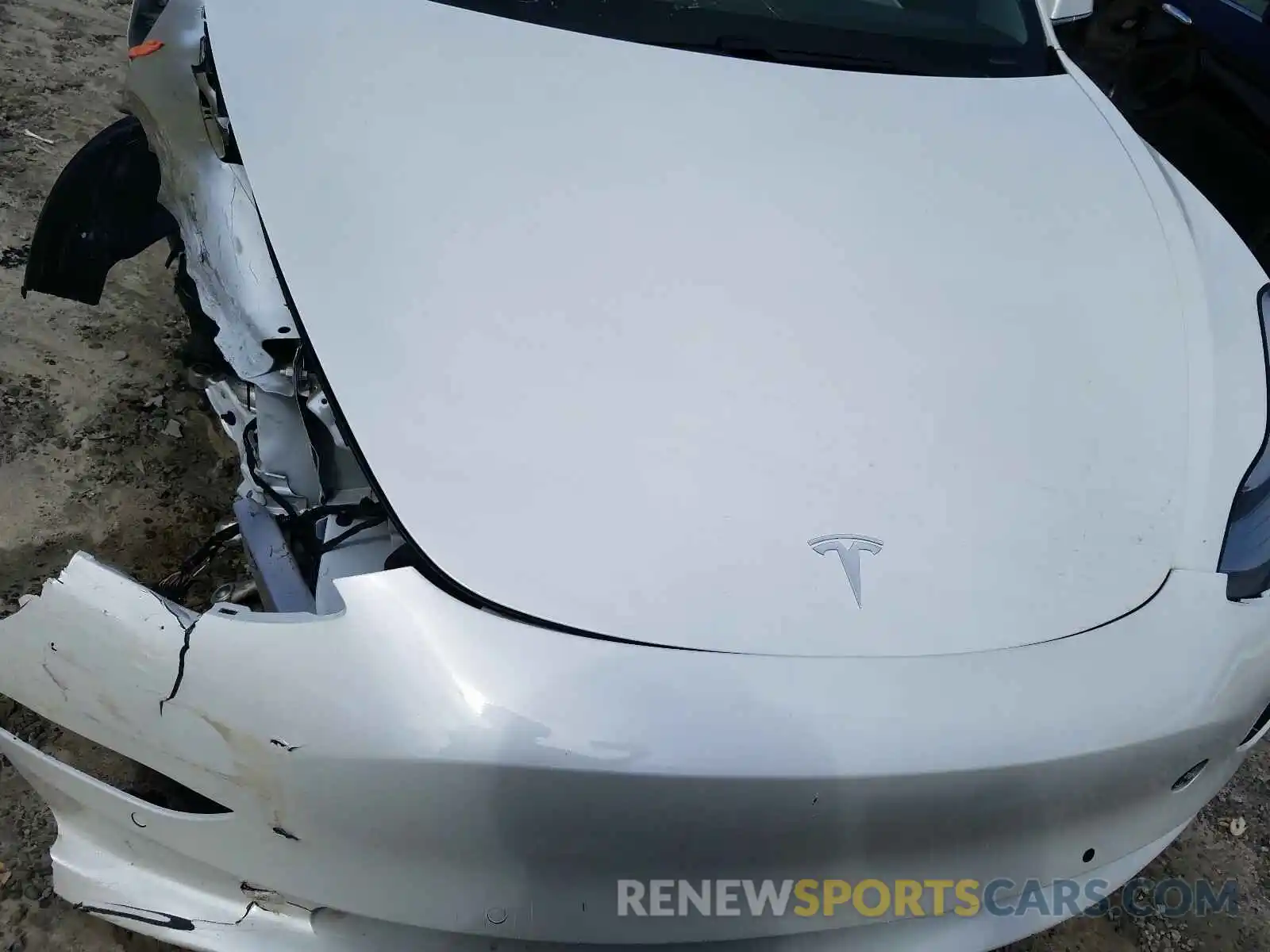 7 Photograph of a damaged car 5YJ3E1EB6LF719774 TESLA MODEL 3 2020