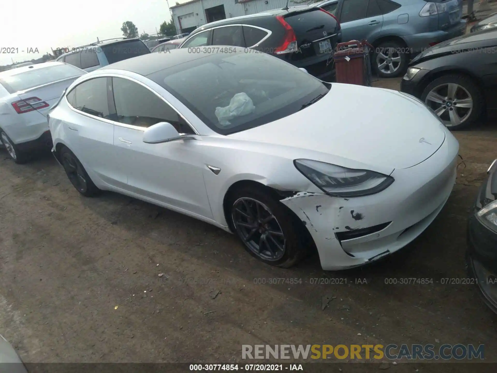 1 Photograph of a damaged car 5YJ3E1EB6LF774919 TESLA MODEL 3 2020