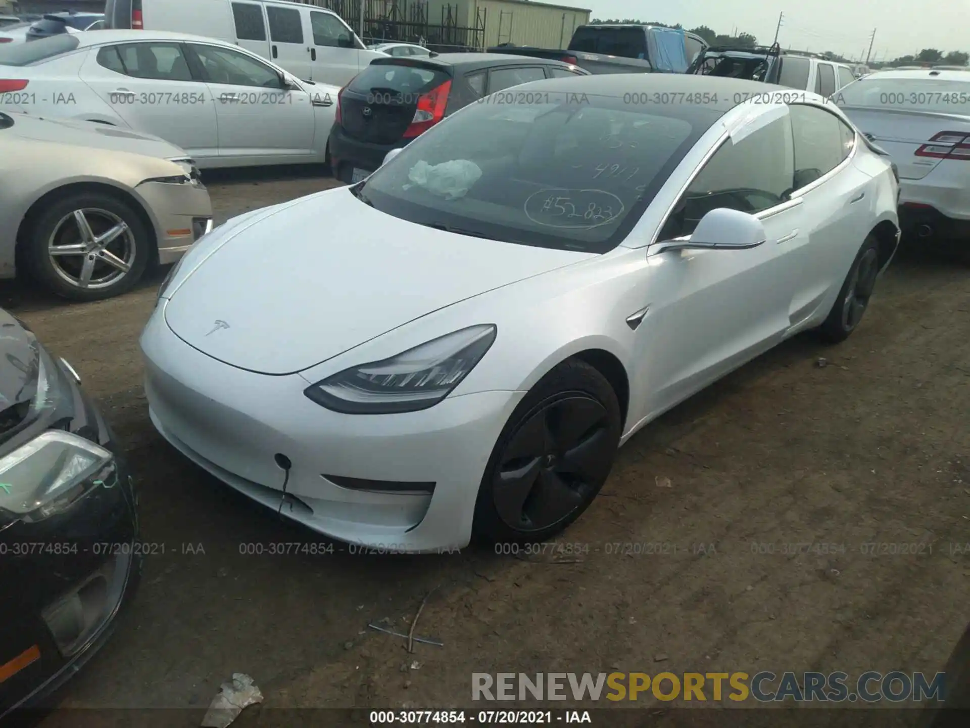 2 Photograph of a damaged car 5YJ3E1EB6LF774919 TESLA MODEL 3 2020