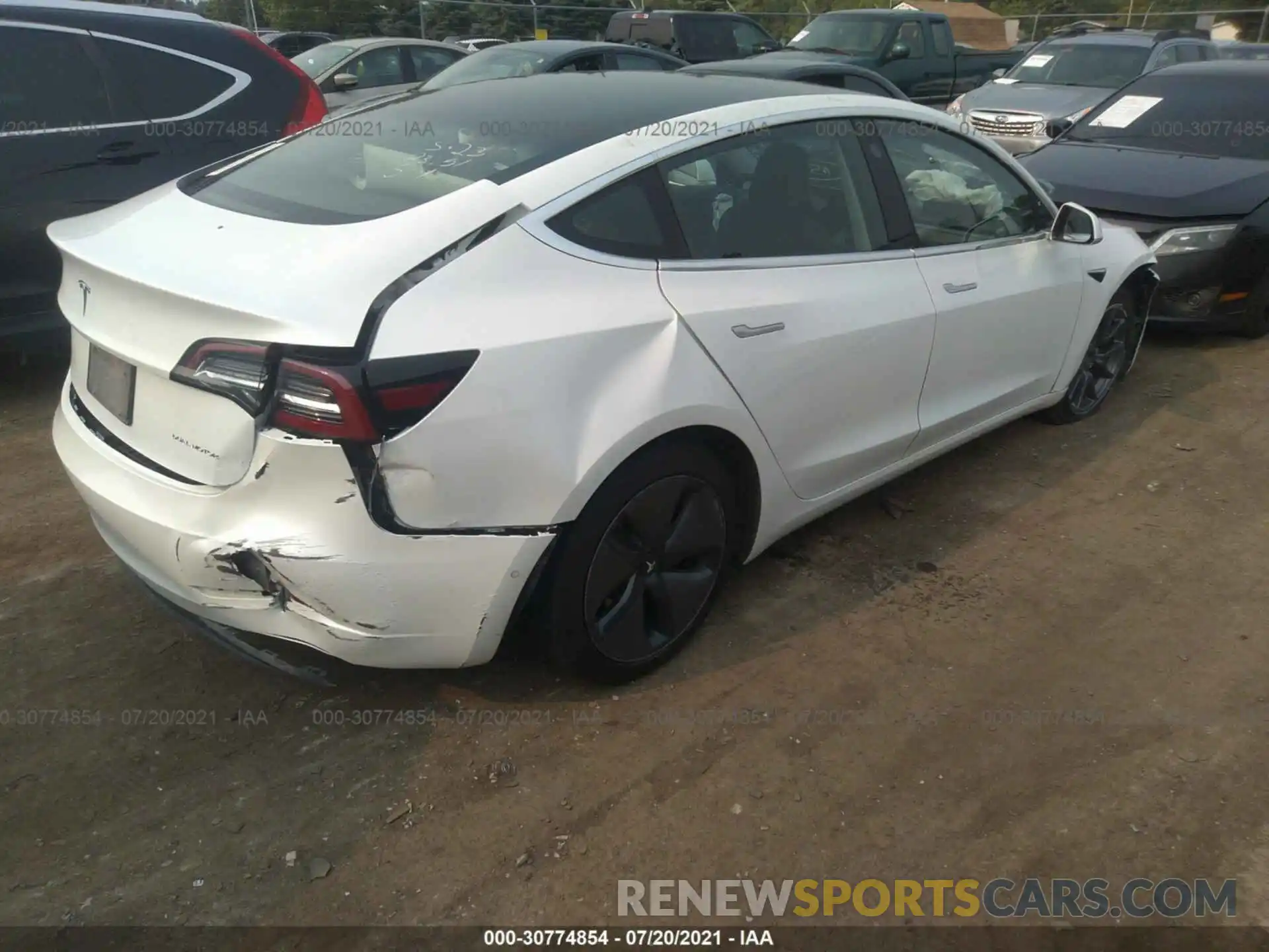 4 Photograph of a damaged car 5YJ3E1EB6LF774919 TESLA MODEL 3 2020