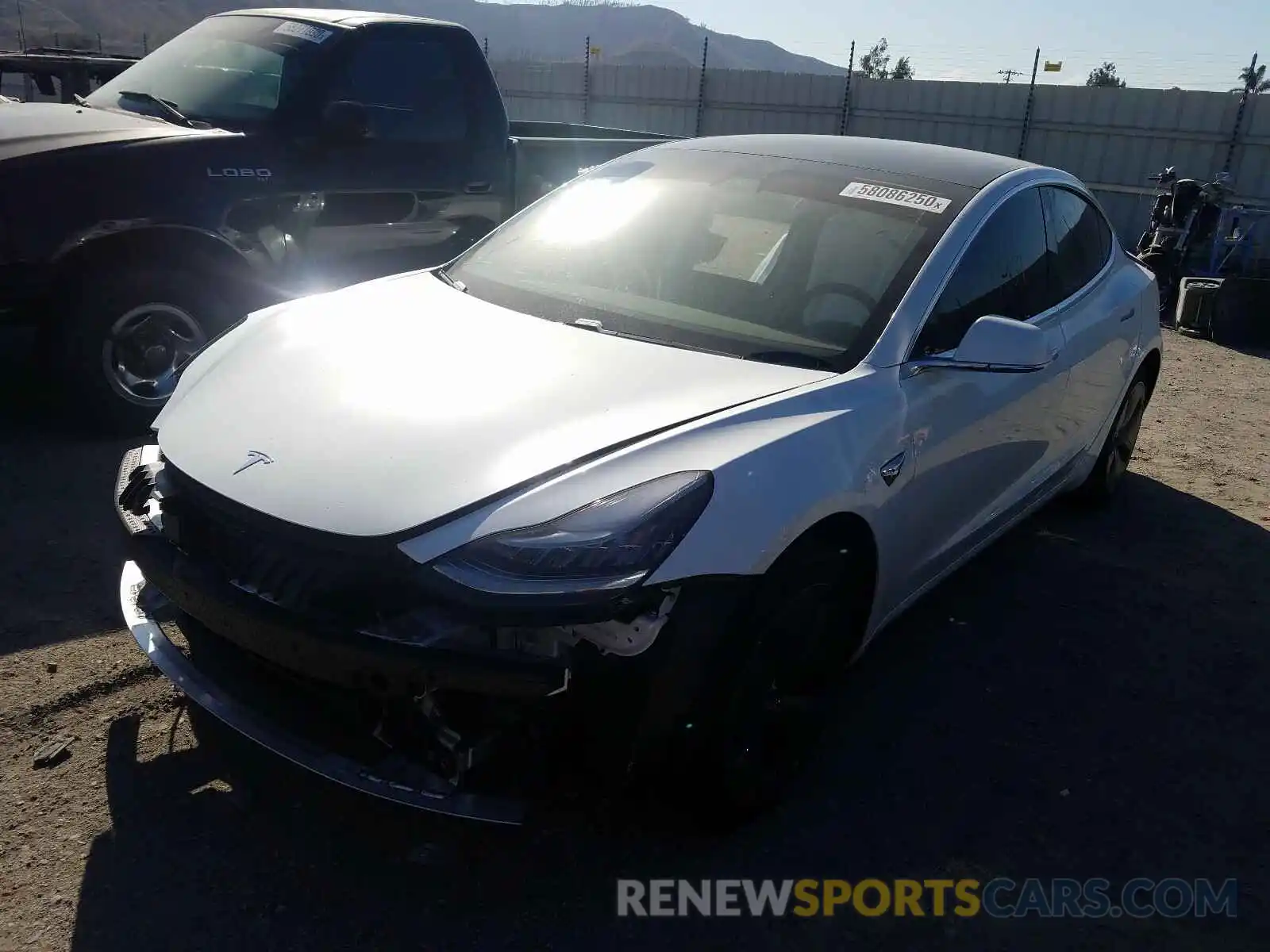 2 Photograph of a damaged car 5YJ3E1EB6LF801794 TESLA MODEL 3 2020