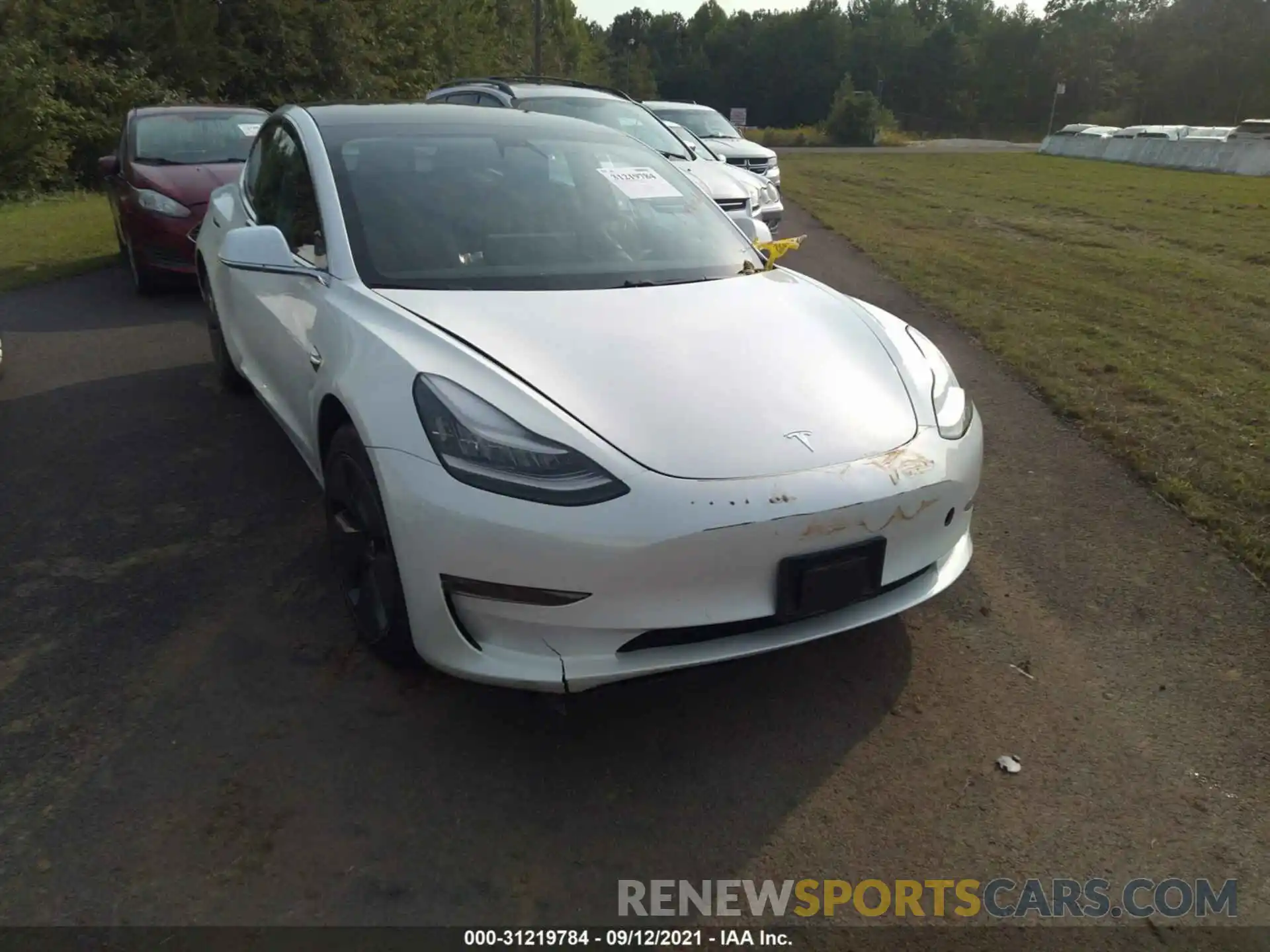 1 Photograph of a damaged car 5YJ3E1EB7LF618128 TESLA MODEL 3 2020