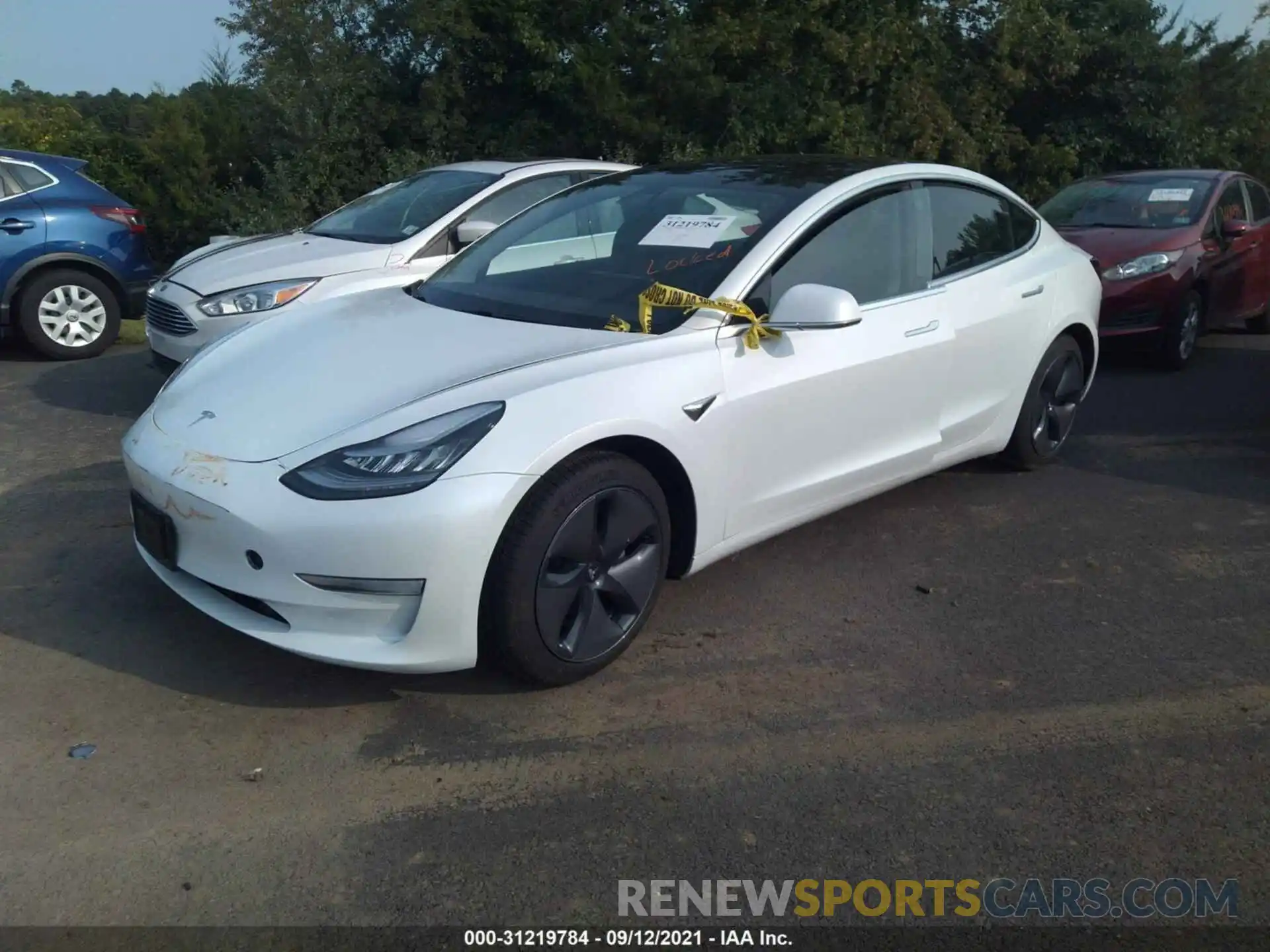 2 Photograph of a damaged car 5YJ3E1EB7LF618128 TESLA MODEL 3 2020