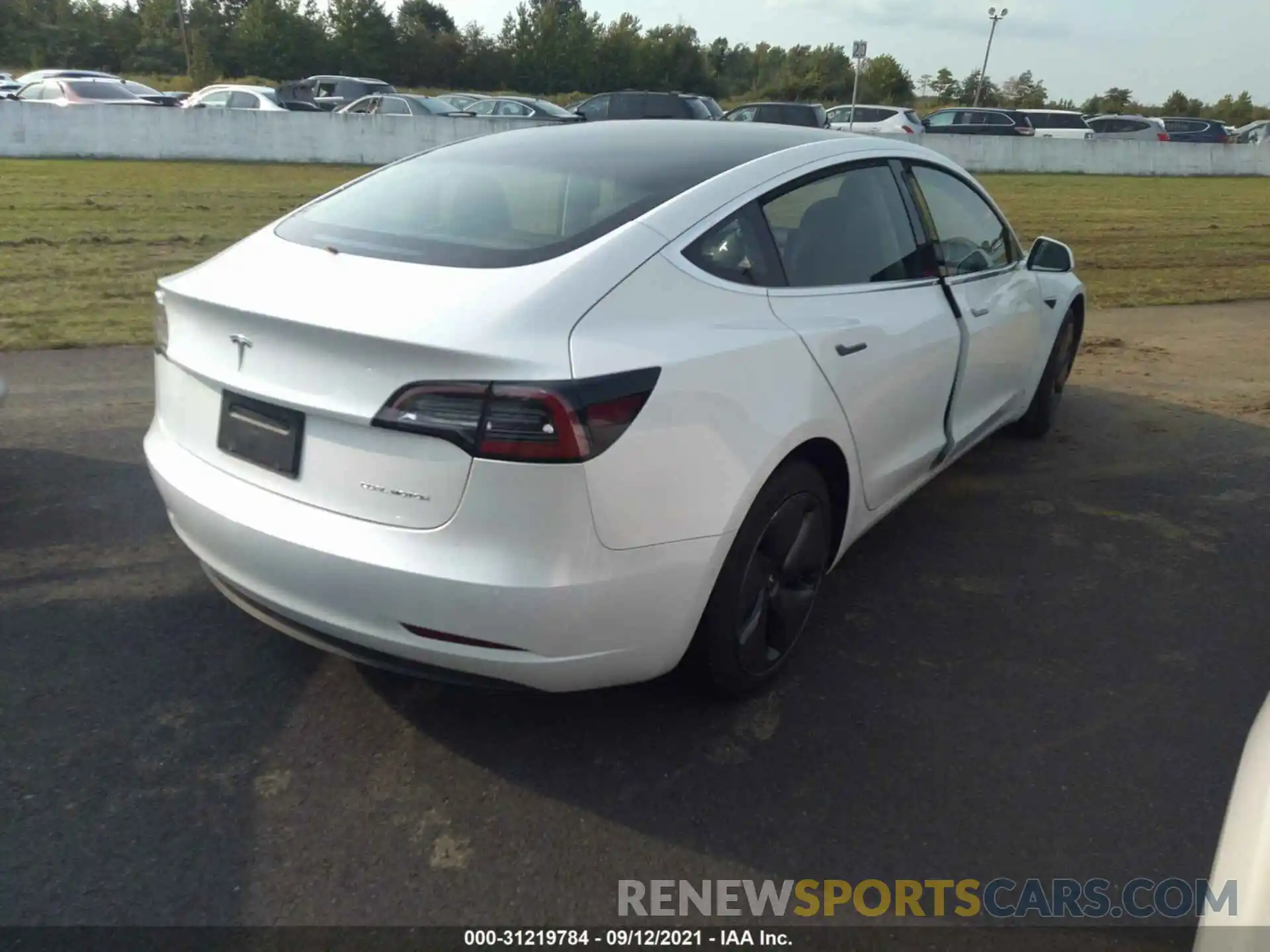 4 Photograph of a damaged car 5YJ3E1EB7LF618128 TESLA MODEL 3 2020