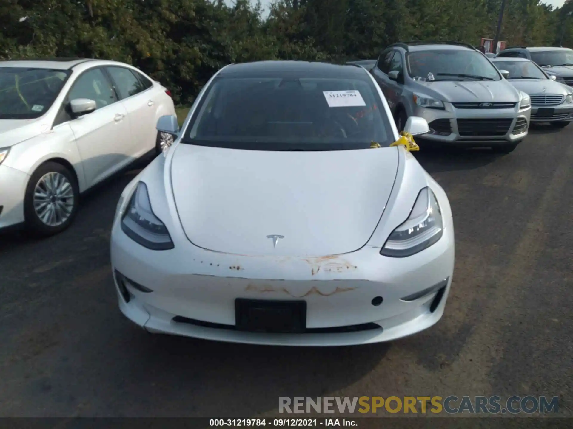 6 Photograph of a damaged car 5YJ3E1EB7LF618128 TESLA MODEL 3 2020