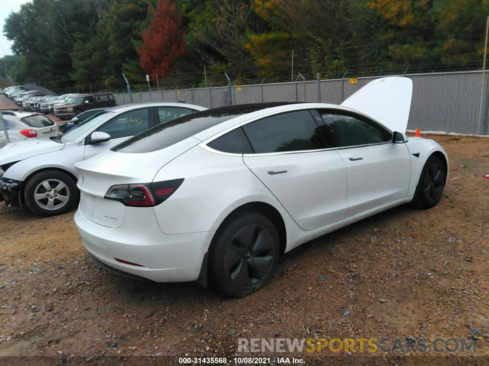 4 Photograph of a damaged car 5YJ3E1EB7LF618954 TESLA MODEL 3 2020