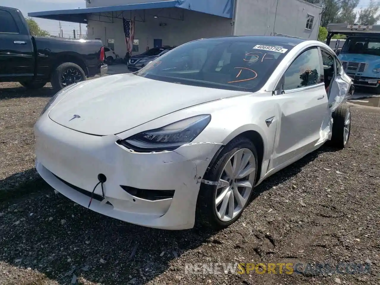 2 Photograph of a damaged car 5YJ3E1EB7LF638718 TESLA MODEL 3 2020