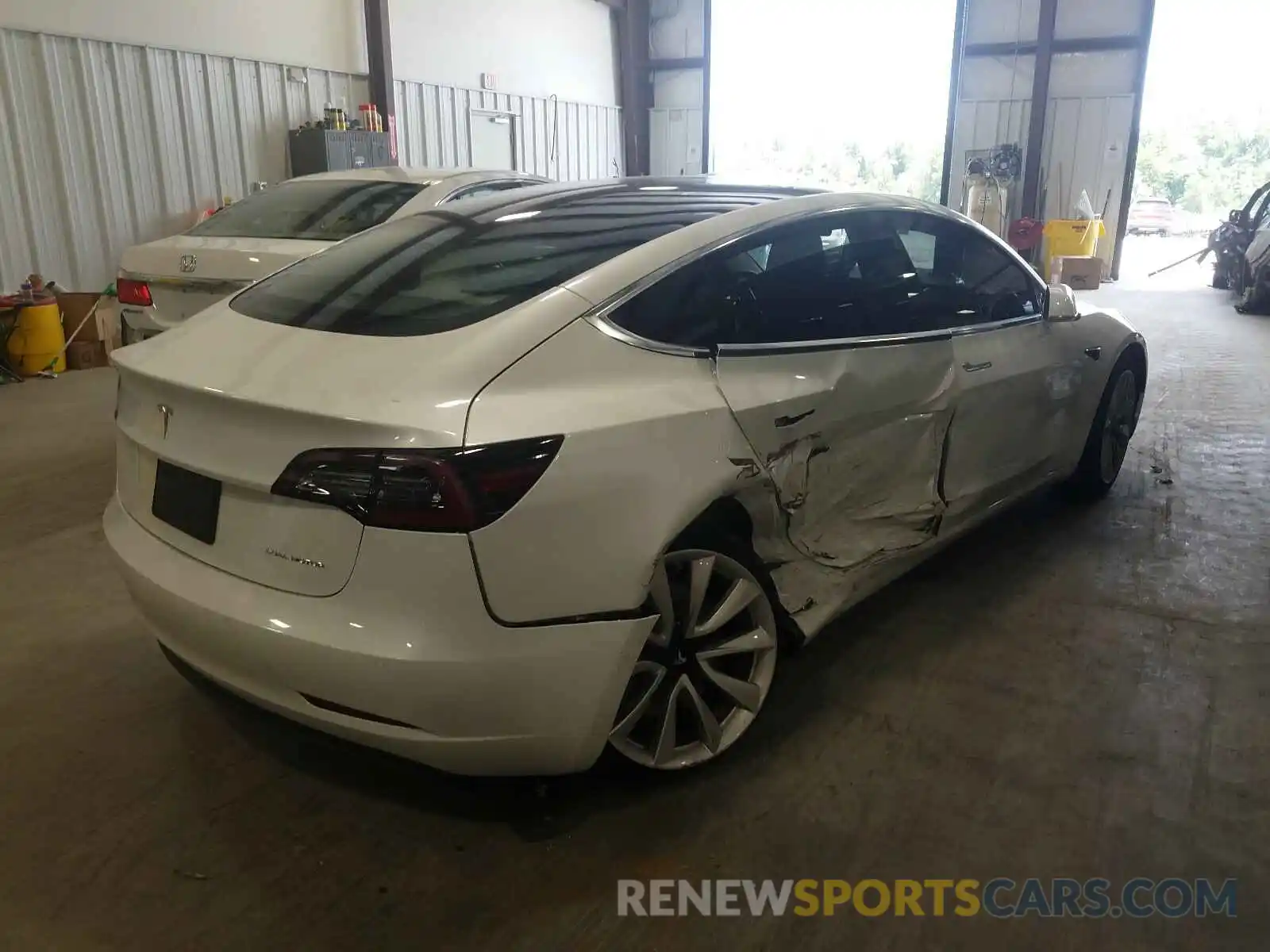 4 Photograph of a damaged car 5YJ3E1EB7LF640338 TESLA MODEL 3 2020