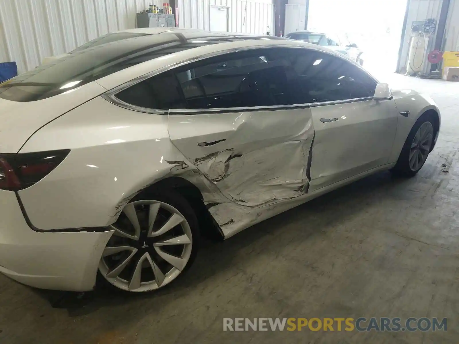 9 Photograph of a damaged car 5YJ3E1EB7LF640338 TESLA MODEL 3 2020