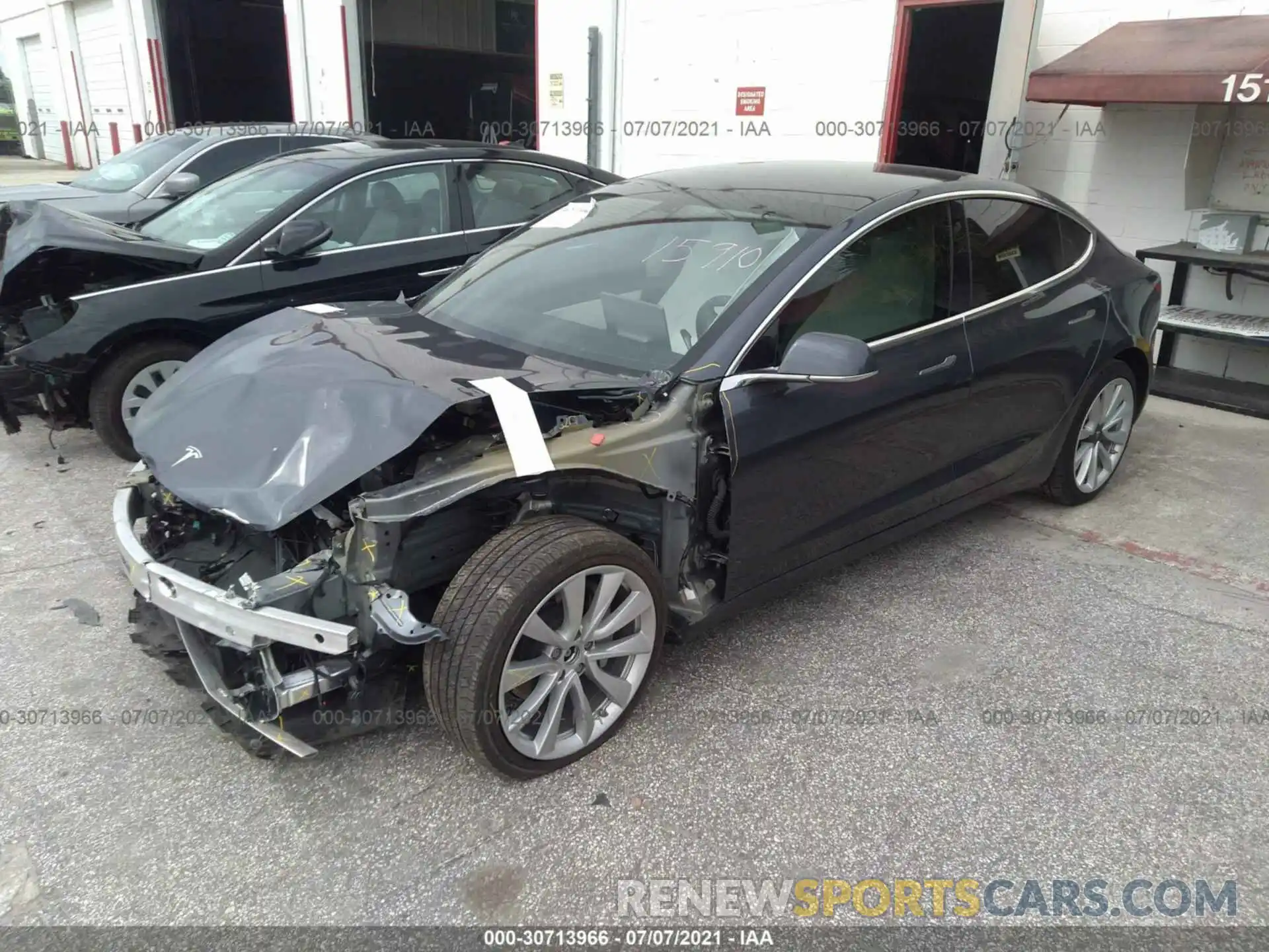 2 Photograph of a damaged car 5YJ3E1EB7LF668804 TESLA MODEL 3 2020