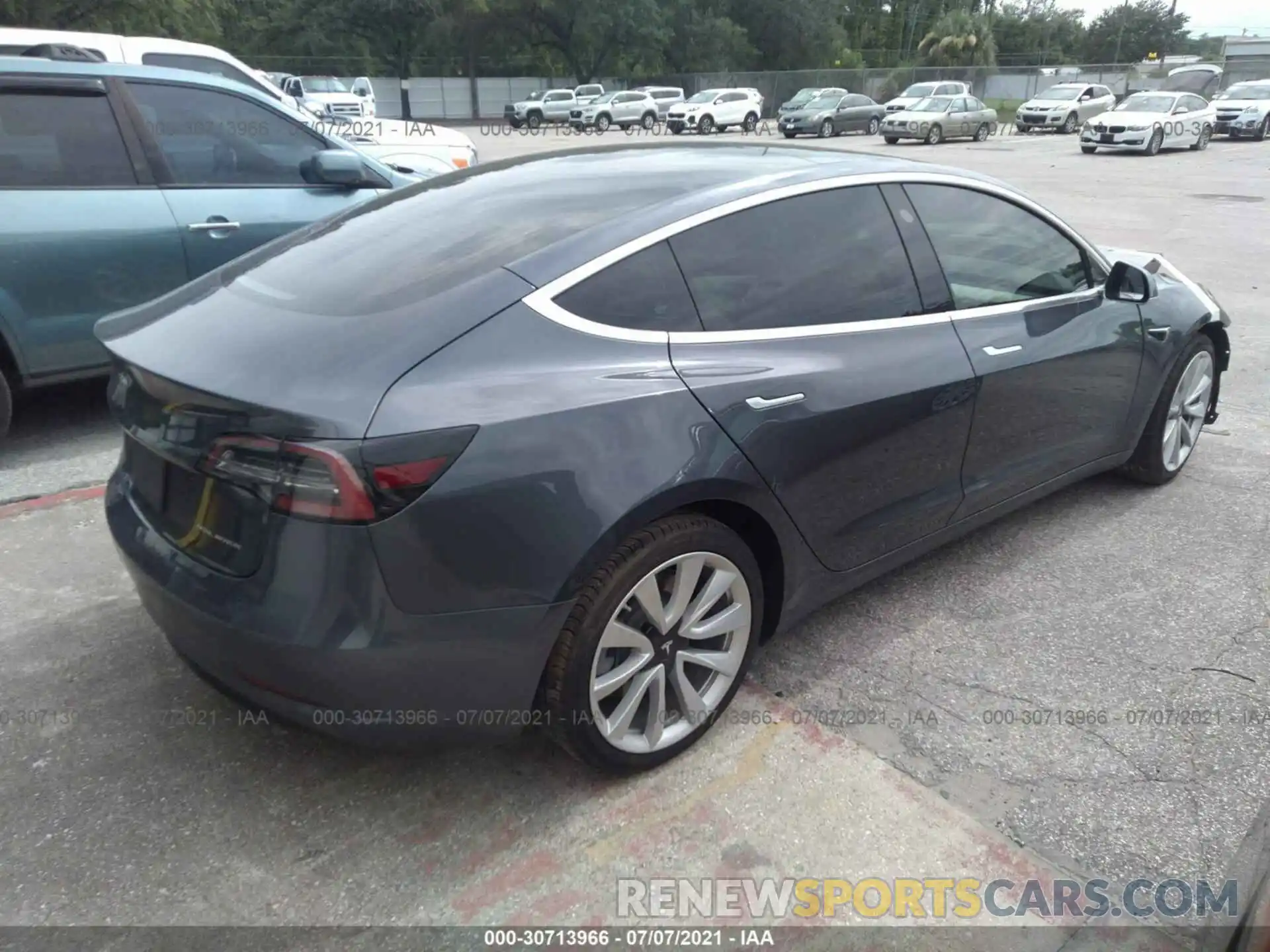 4 Photograph of a damaged car 5YJ3E1EB7LF668804 TESLA MODEL 3 2020