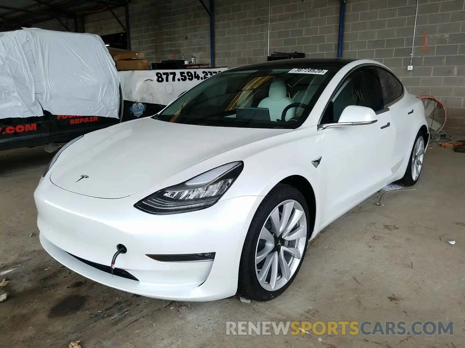 2 Photograph of a damaged car 5YJ3E1EB7LF703762 TESLA MODEL 3 2020