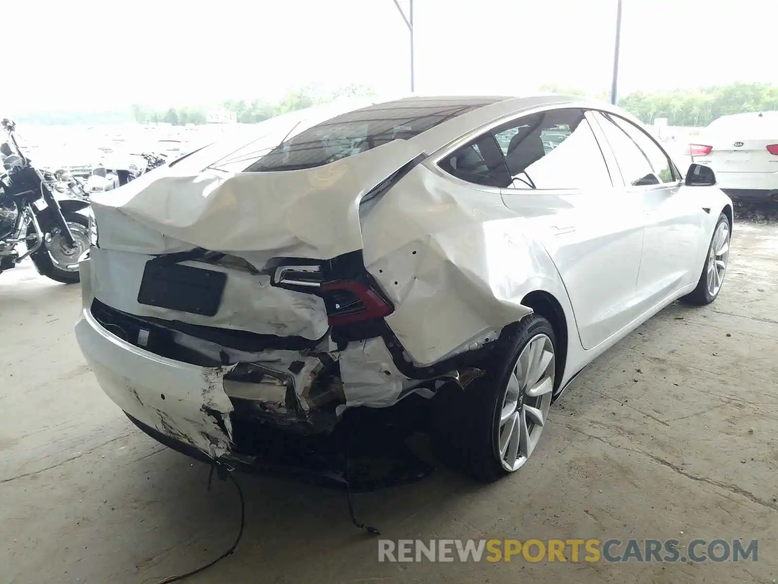 4 Photograph of a damaged car 5YJ3E1EB7LF703762 TESLA MODEL 3 2020