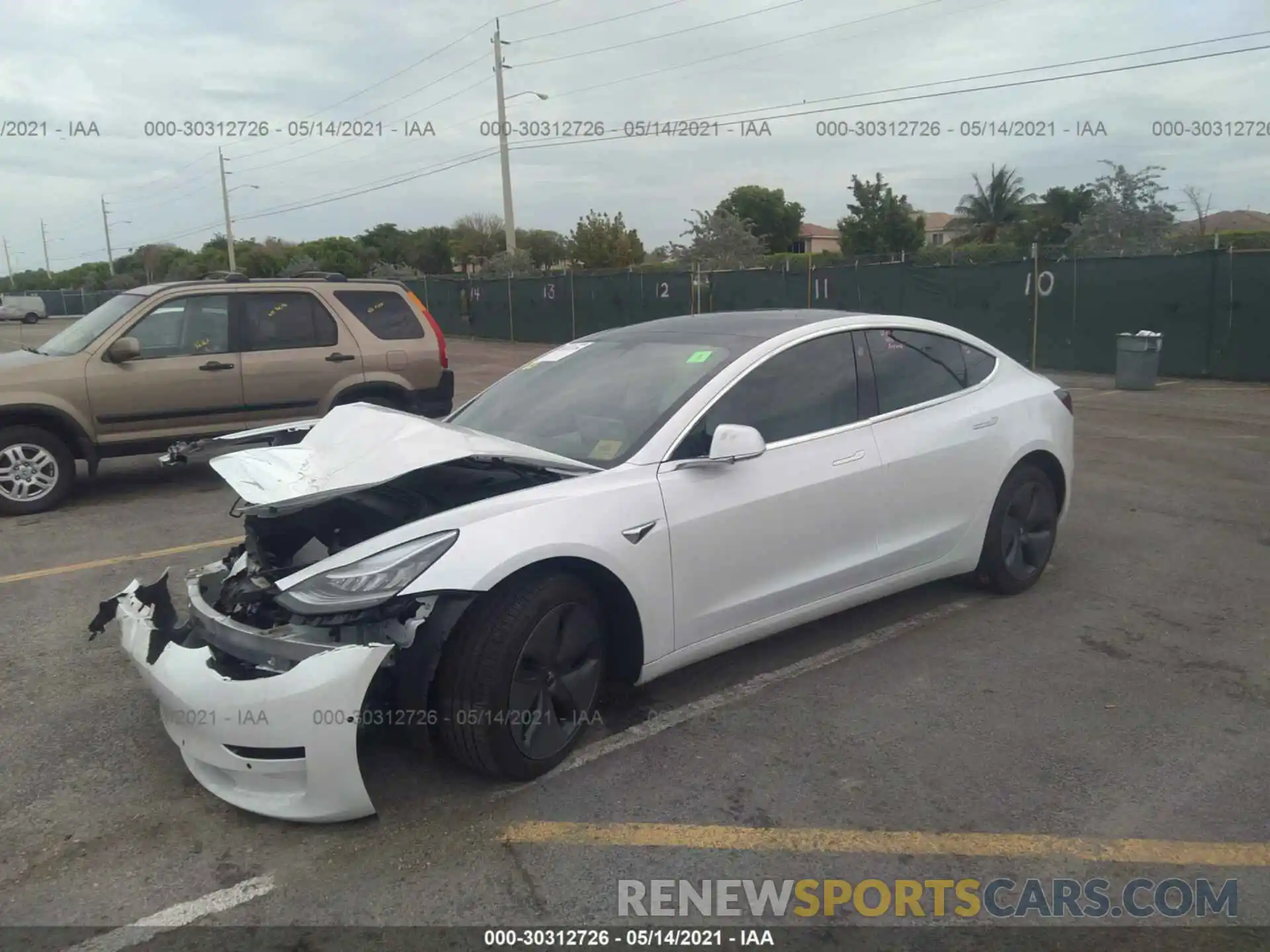 2 Photograph of a damaged car 5YJ3E1EB7LF720156 TESLA MODEL 3 2020